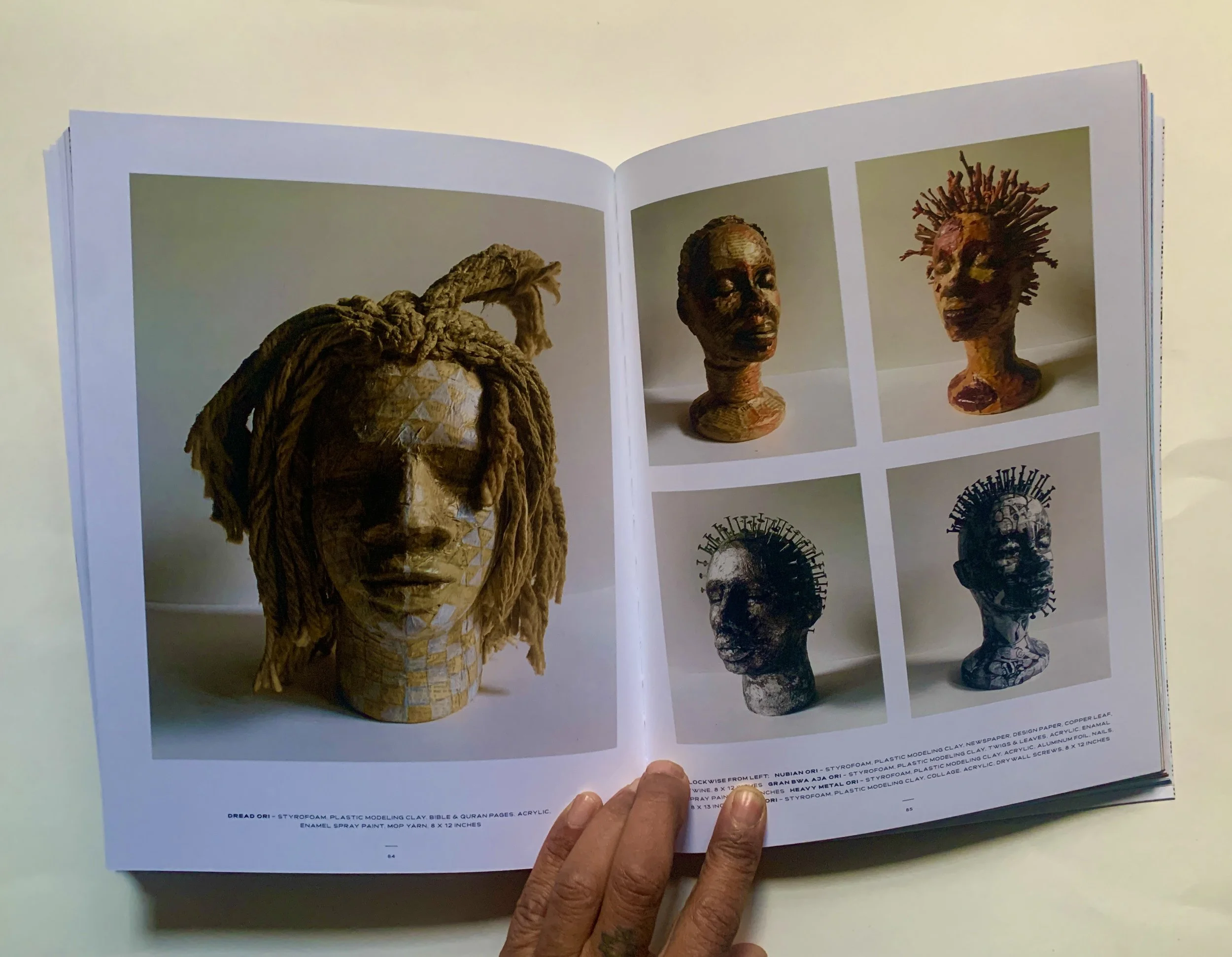  I  AM - GODBODY 108 ARTBOOK     A 165-page artbook printed on heavy stock archival paper of over 120 high resolution images of collages / paintings / sculptures as well as essays, writings, poems exclusively by Jill Scott, Swoon, Jamel Shabazz, Tari
