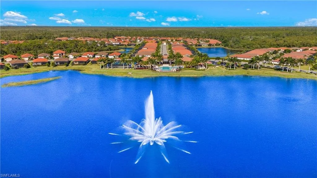 Artesia Naples Clubhouse from Grand Lake.jpeg
