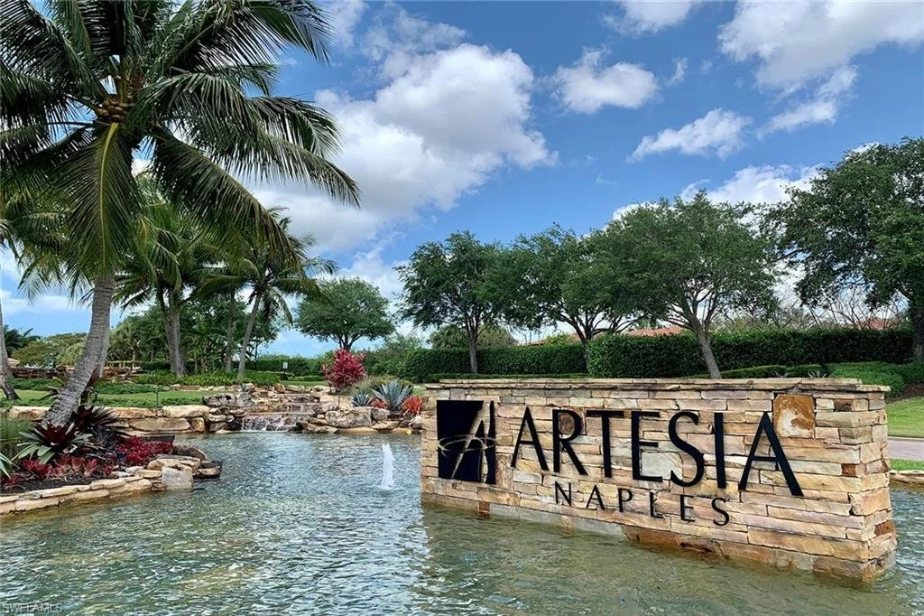 Artesia Naples Sign Surrounded by Water.jpeg