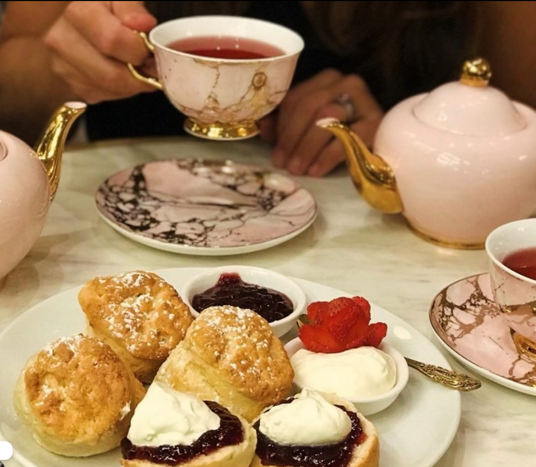 High Tea with scones, jam and cream served with tea at Caffè e Torta in Melbourne’s Royal Arcade