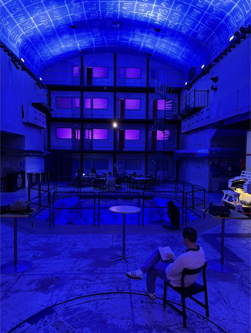 Students writing inside Stockholm's R1 Nuclear Reactor