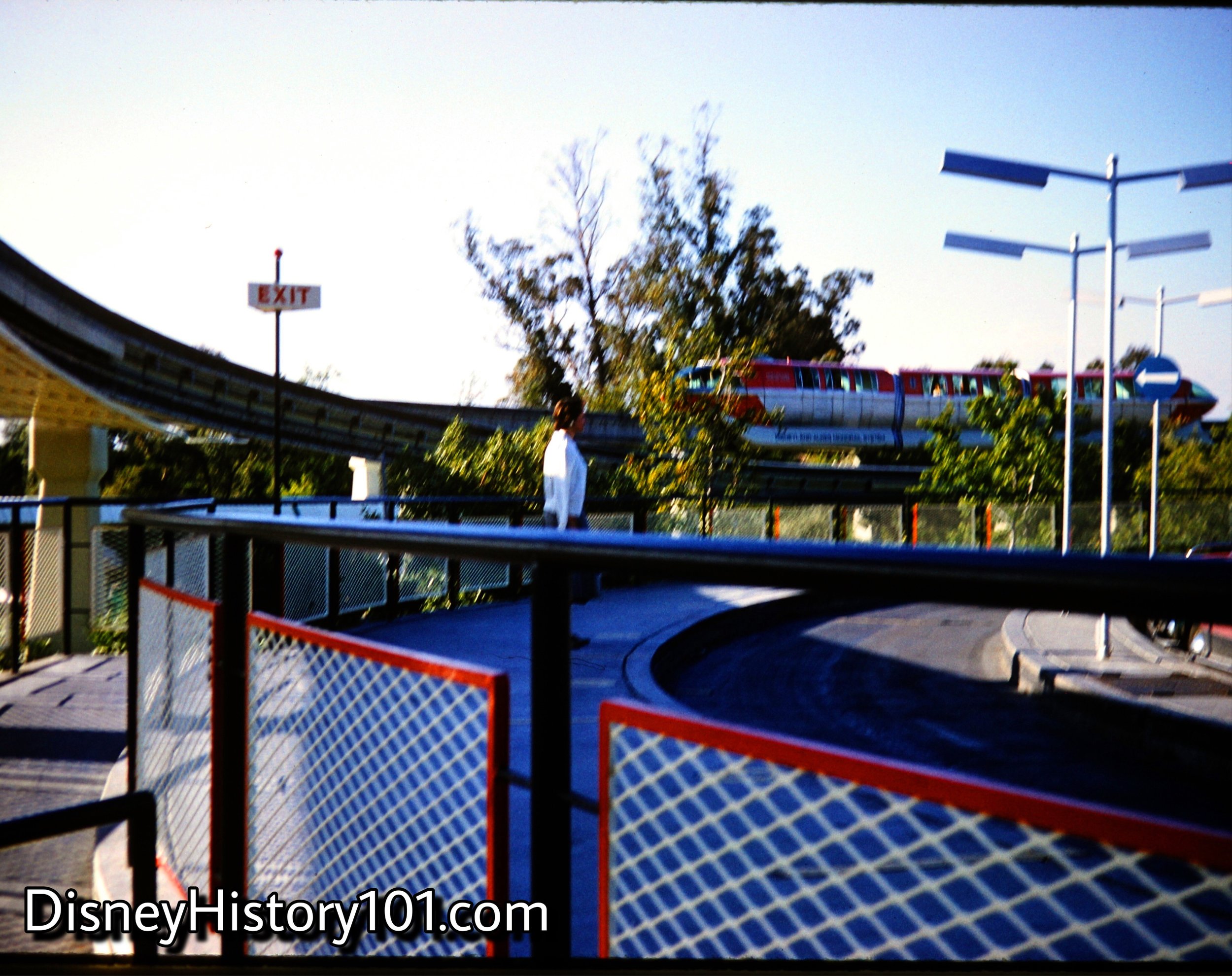 The Monorail Red Mark I passes near the Autopia, (1960)