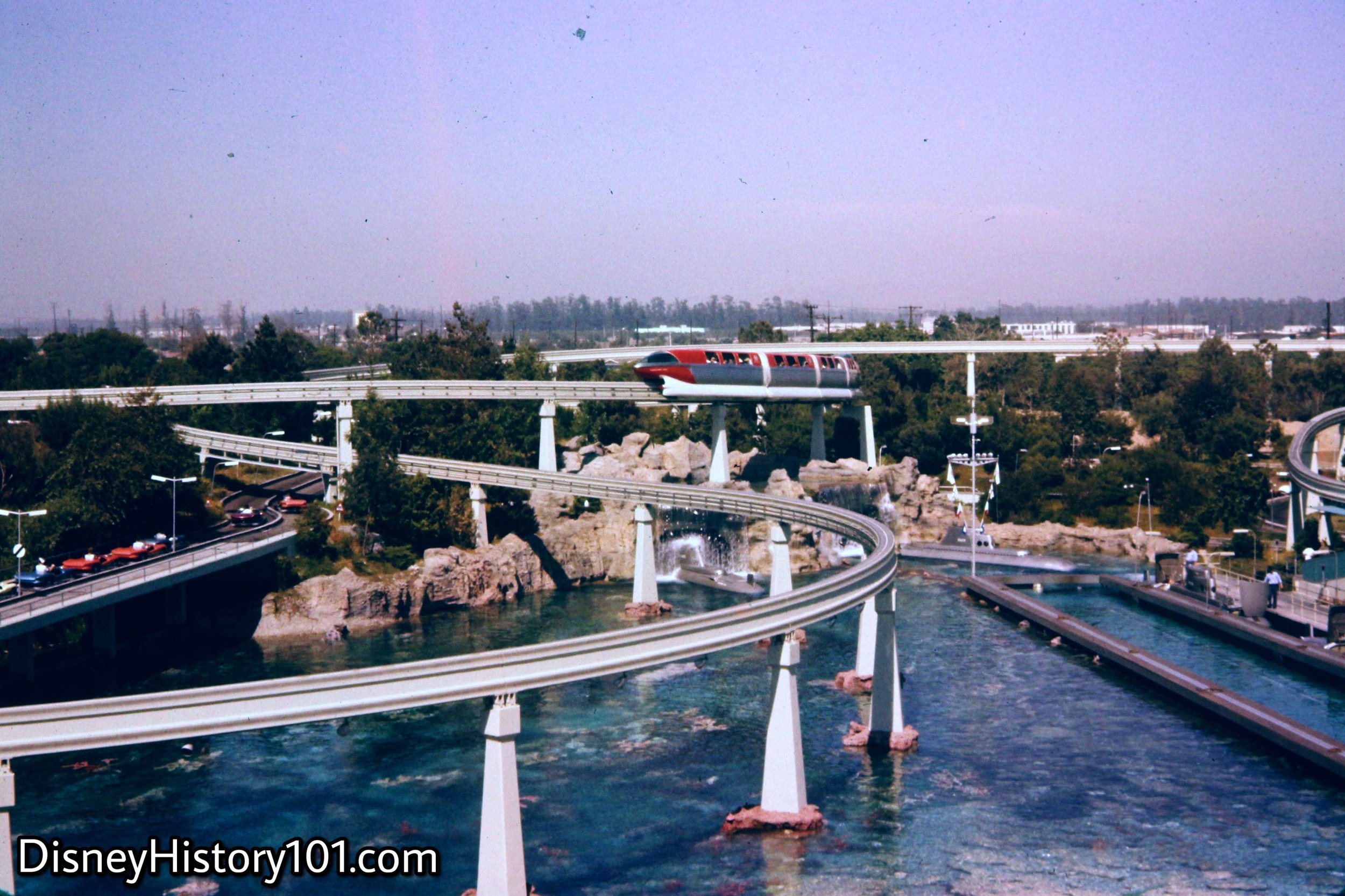 REENTERING THE PARK AND TOMORROWLAND SEGMENT - Monorail Mark II Red.
