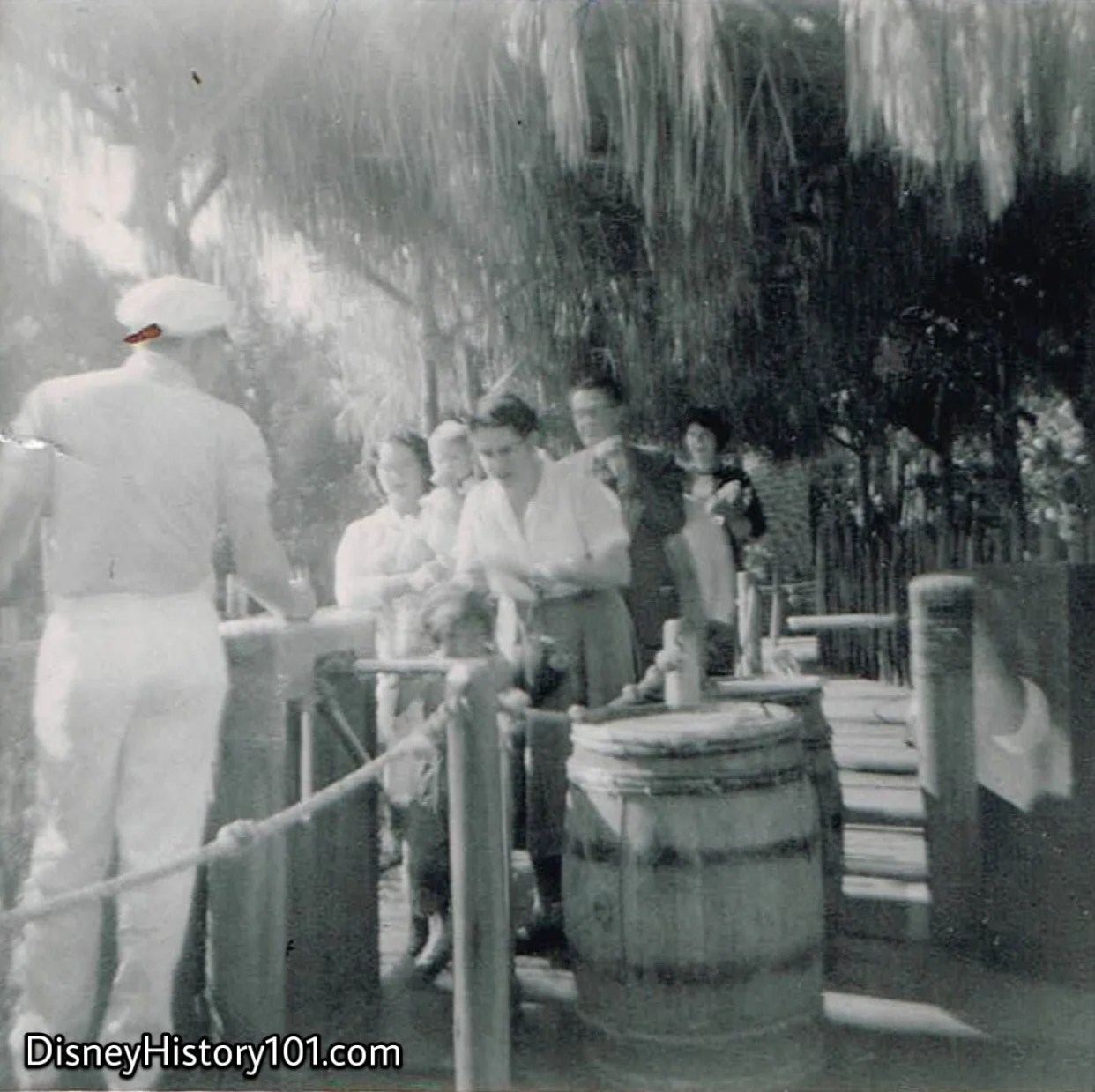 The Jungle Guide greets Guests and takes tickets at the Jungle Cruise Boat Ride Guest Control queue area & Loading Dock