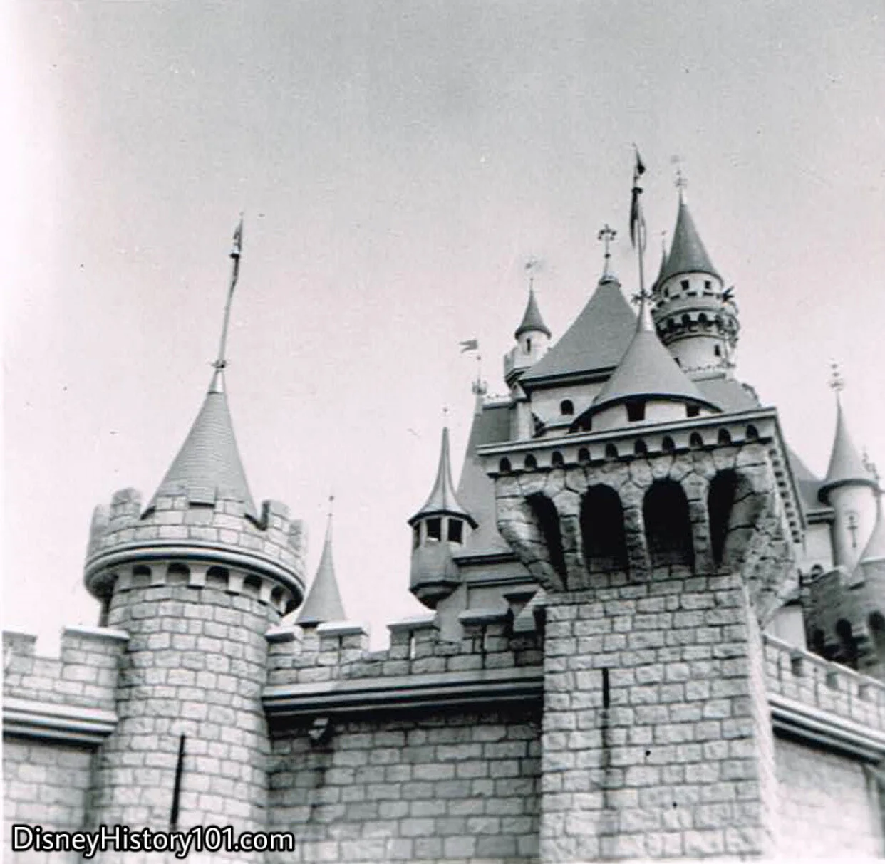 Sleeping Beauty Castle’s towers and battlements rising high in the sky.