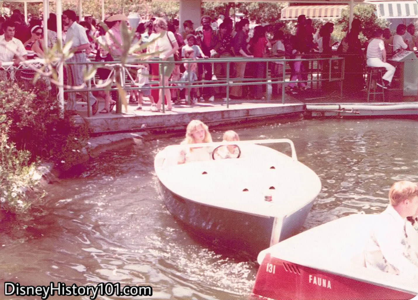 Guests Enjoy A Motor Boat Cruise while other Guests wait in an orderly fashion (queue) to board.