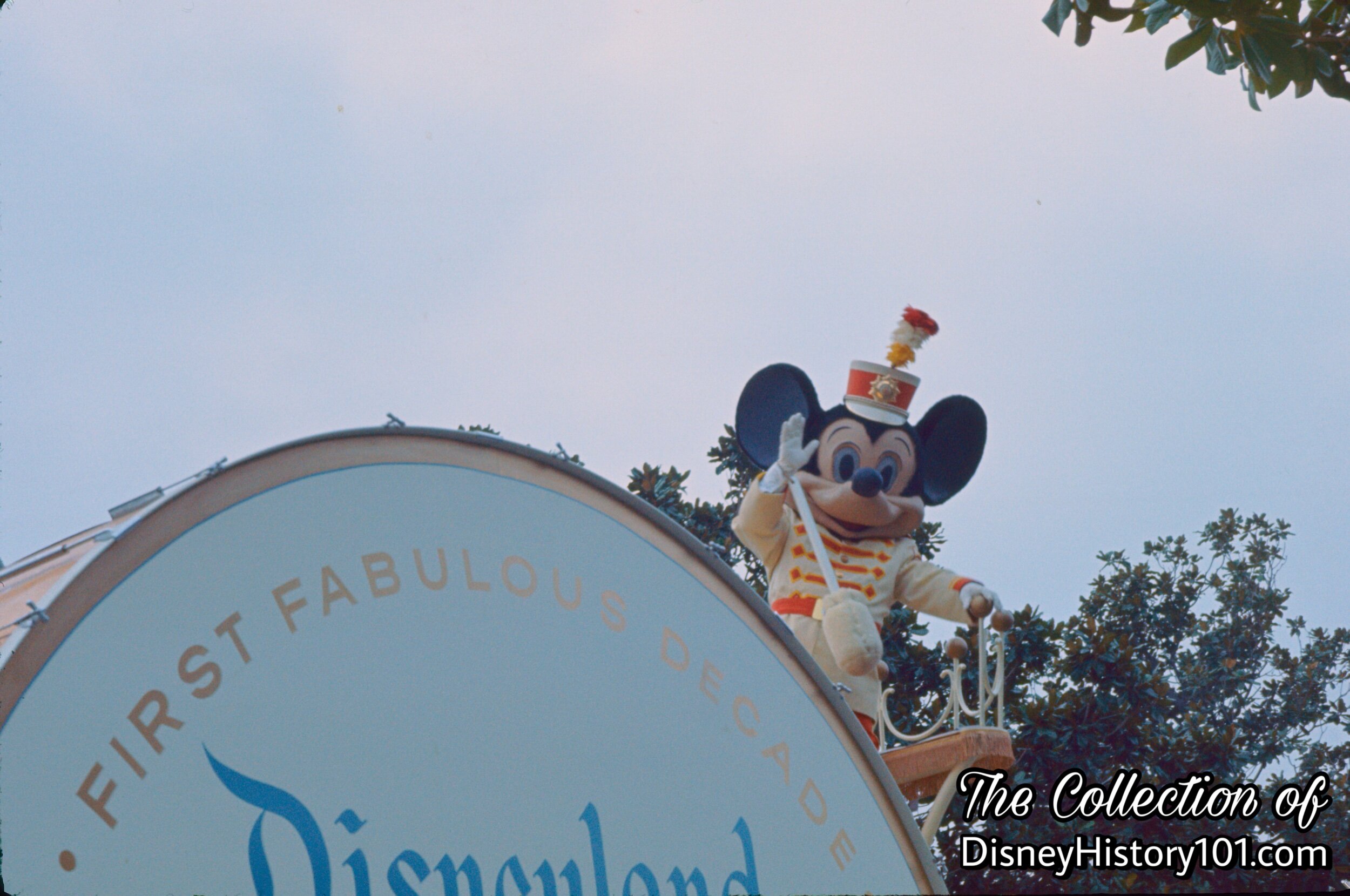 Mickey Mouse & the approximate 11-foot-diameter Biggest Bass Drum, December, 1965.