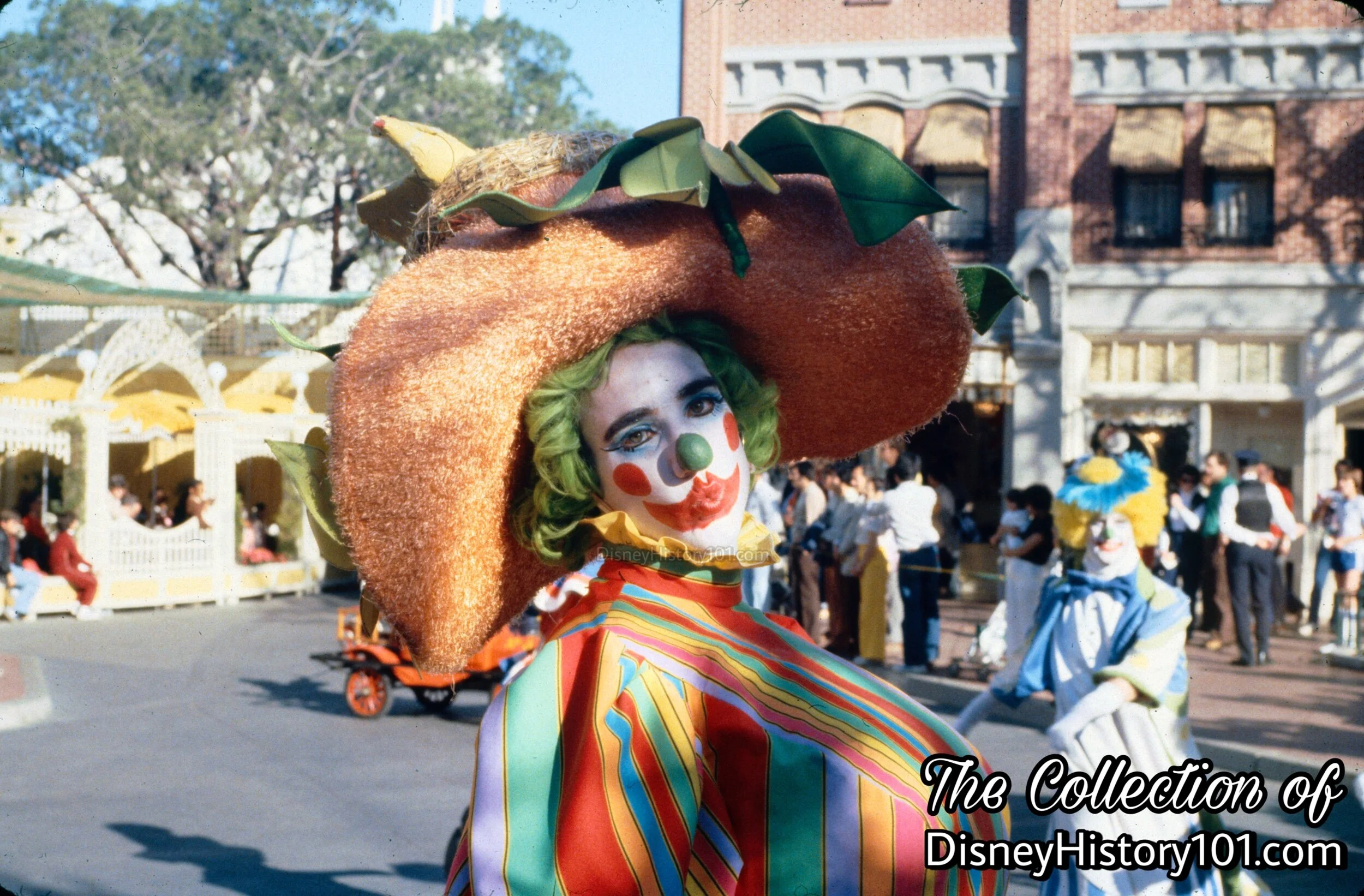 A Clown extends a courteous gesture.