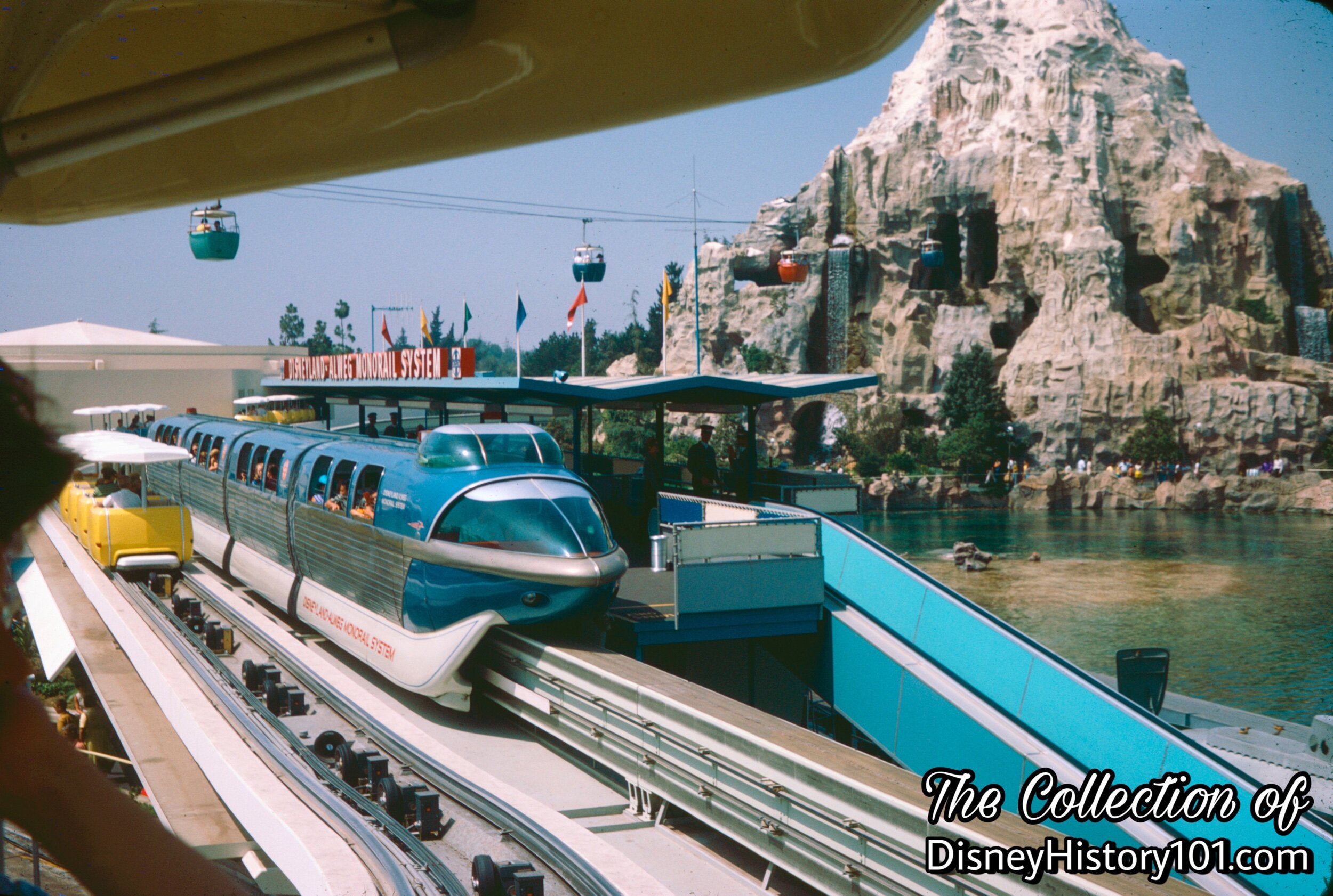 REENTERING THE PARK AND TOMORROWLAND SEGMENT - Monorail Mark II Blue, 1967.