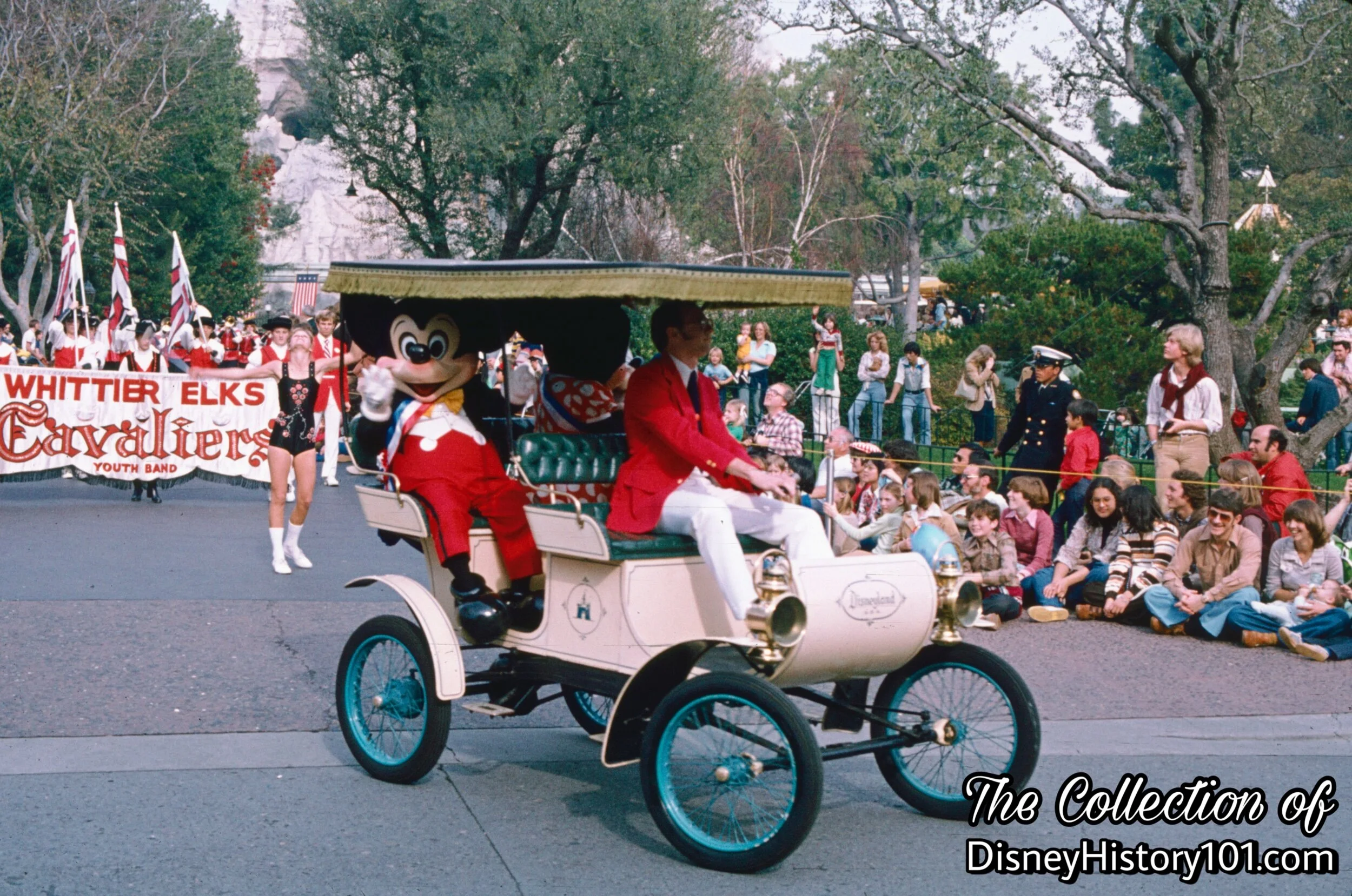 Mickey Mouse rides aboard a Disneyland DMC (on Matterhorn Road) in Celebrate America