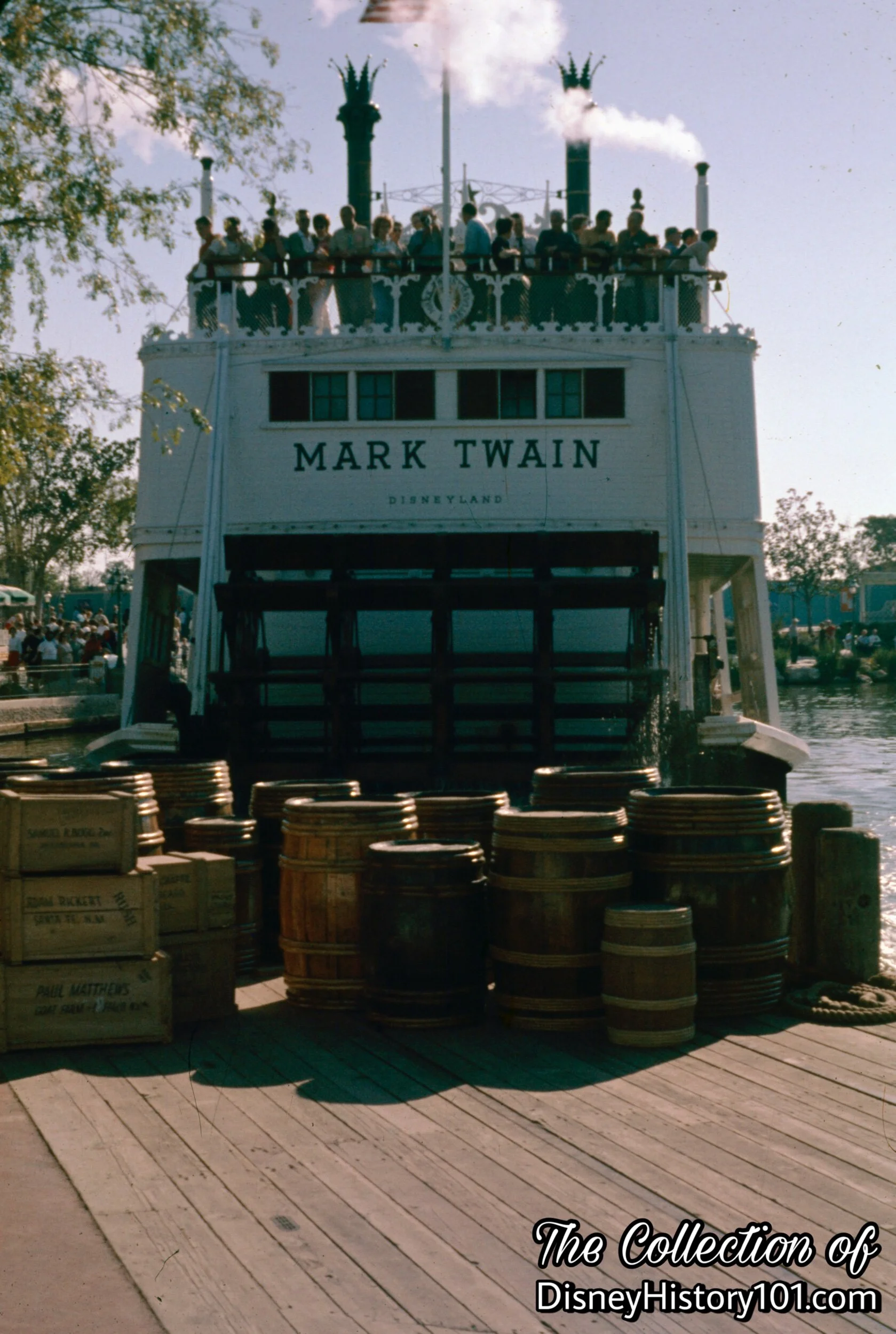  At the  Frontierland Docks  (along the New Orleans Square section of Frontierland), cargo of boxes, barrels, buckets, sacks, and cotton bales wait to be loaded aboard the steam ship. 