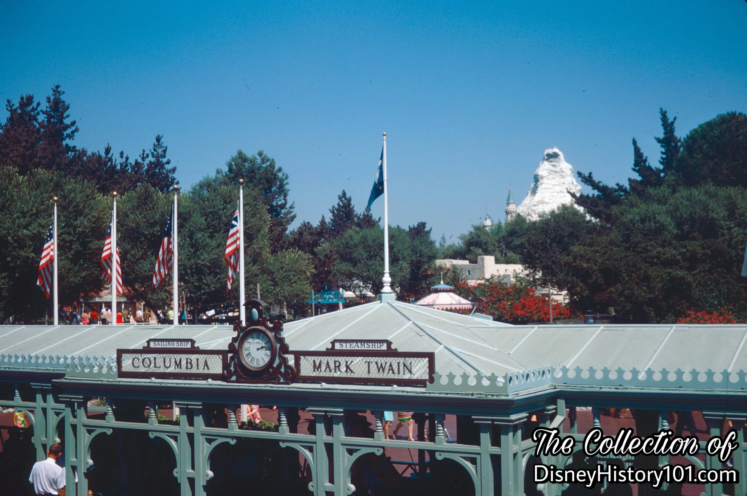 Mark Twain Steamboat Dock Guest Waiting Area with early American Flags and Disneyland Flag