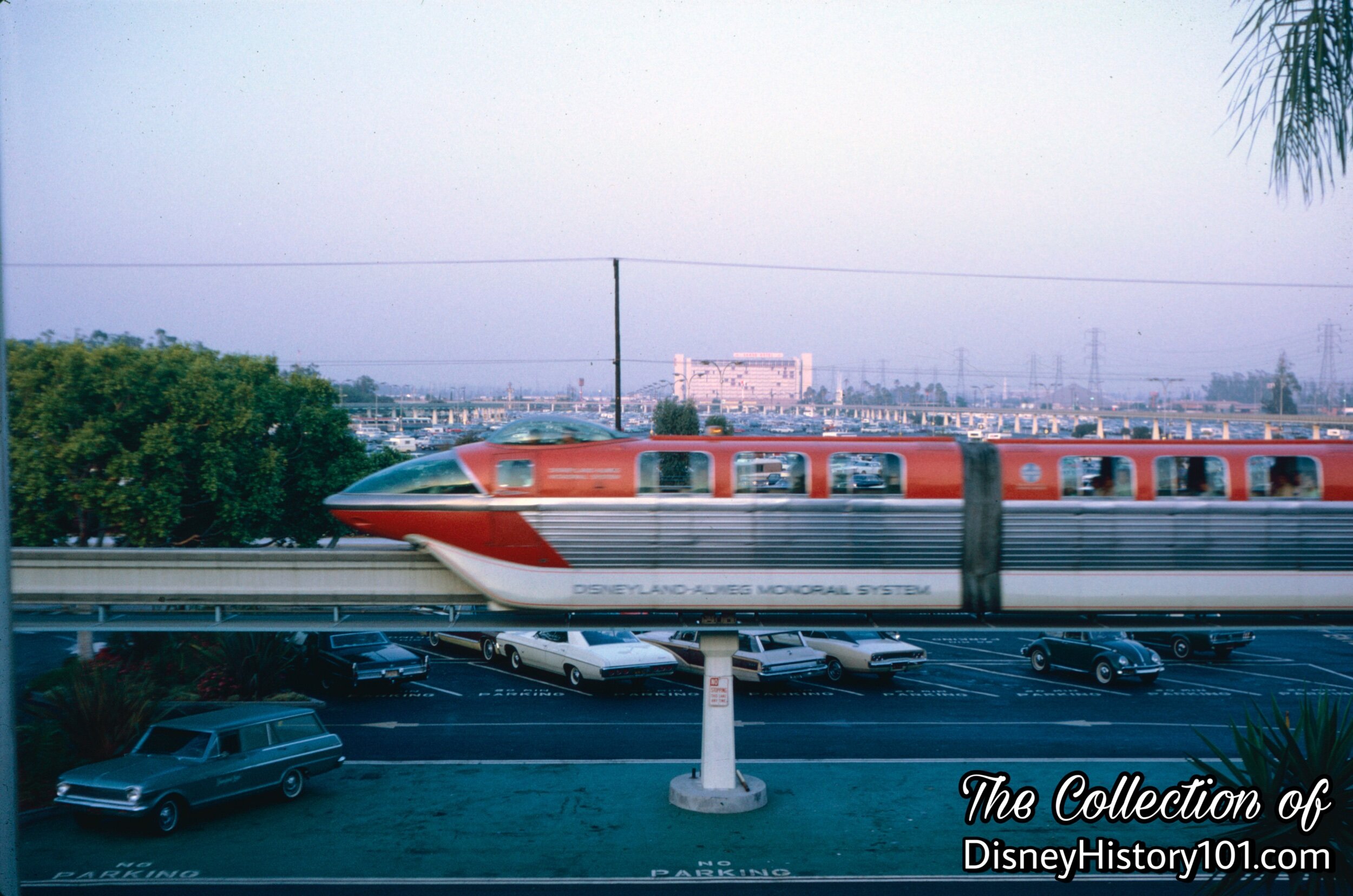 REENTERING THE PARK AND TOMORROWLAND SEGMENT - Monorail Mark II Red, 1968.