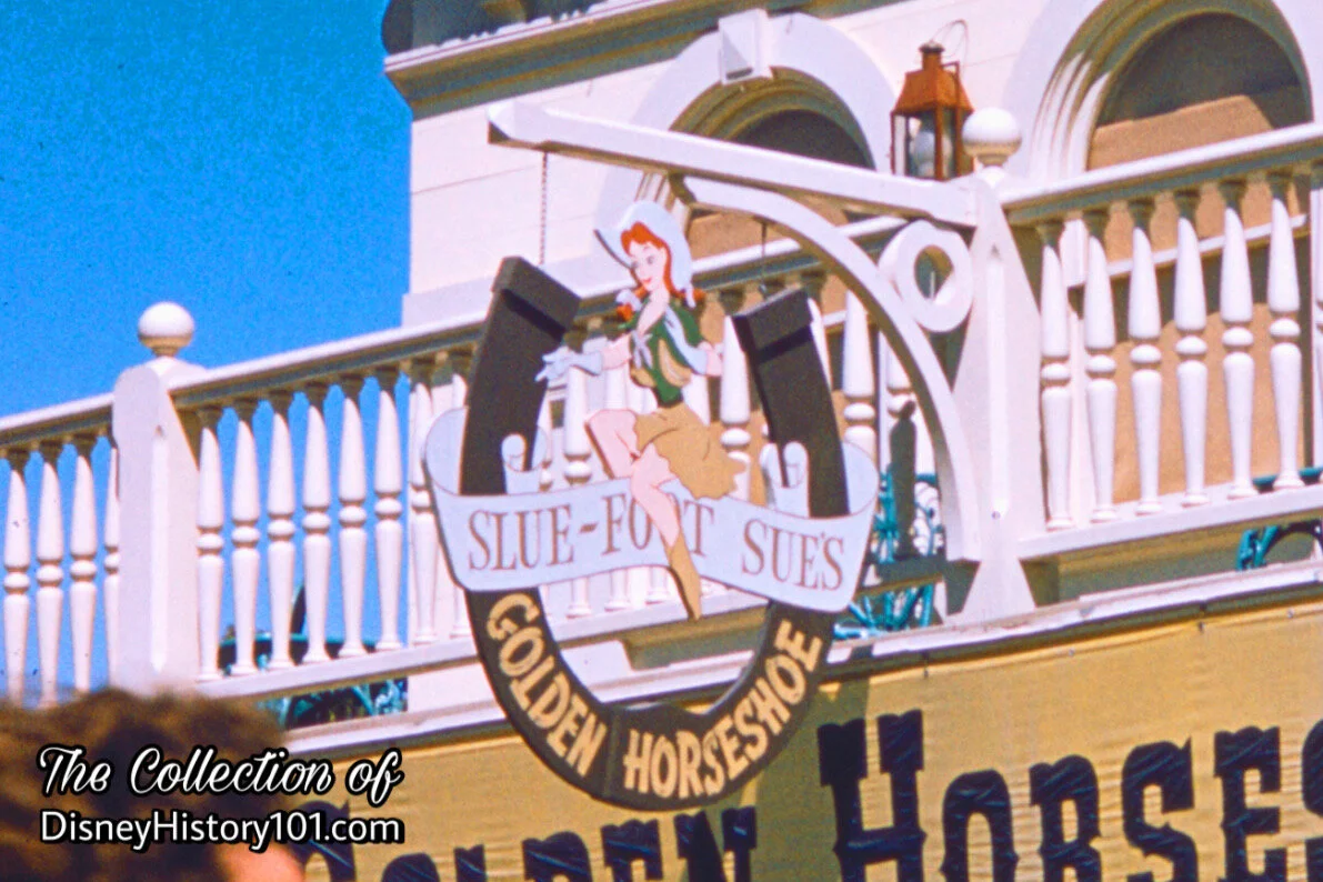 Slue Foot Sue's Golden Horseshoe Sign featuring the namesake popular Character from the Walt Disney Production.