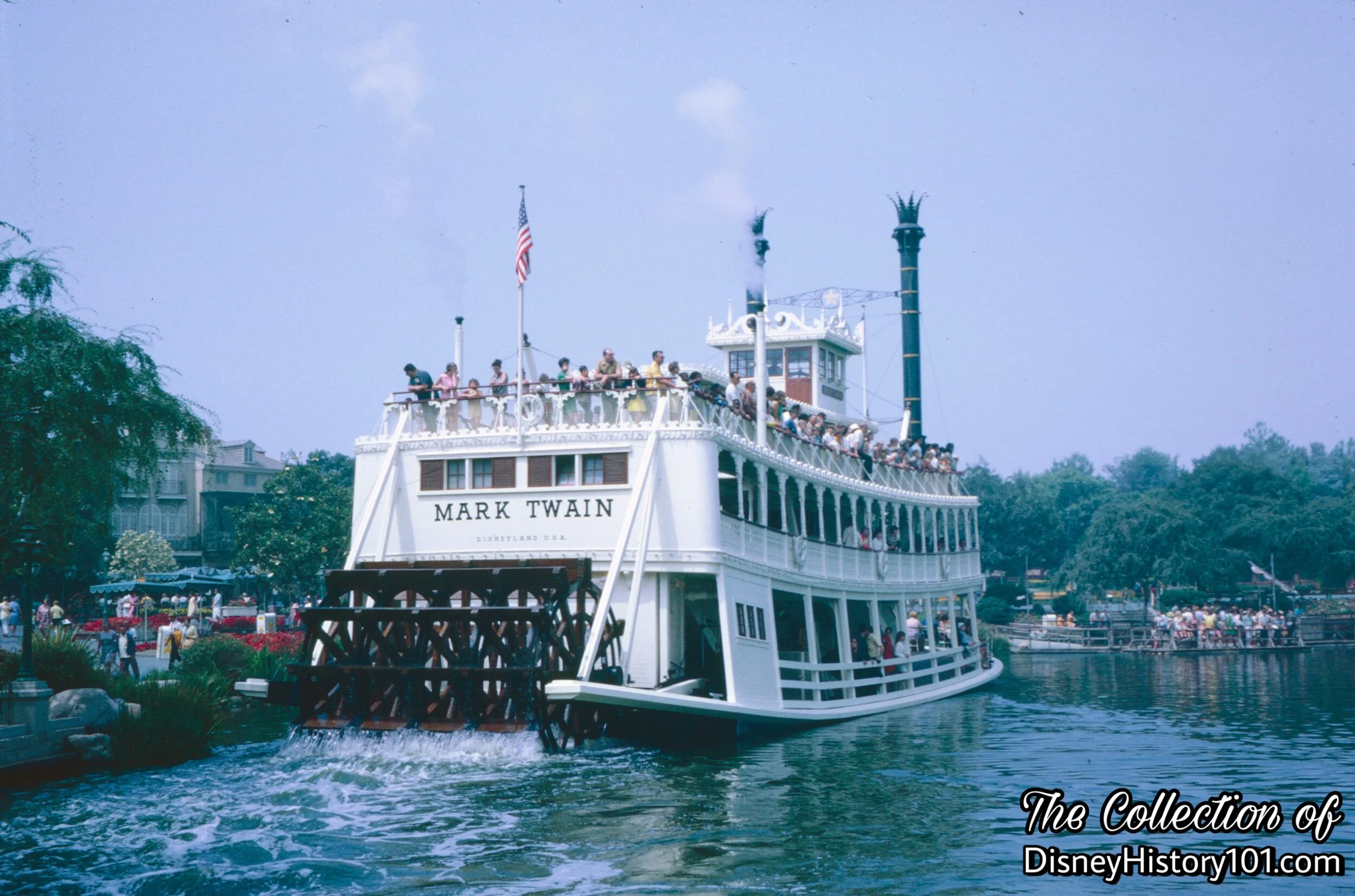The Mark Twain Riverboat plies the Rivers of America.