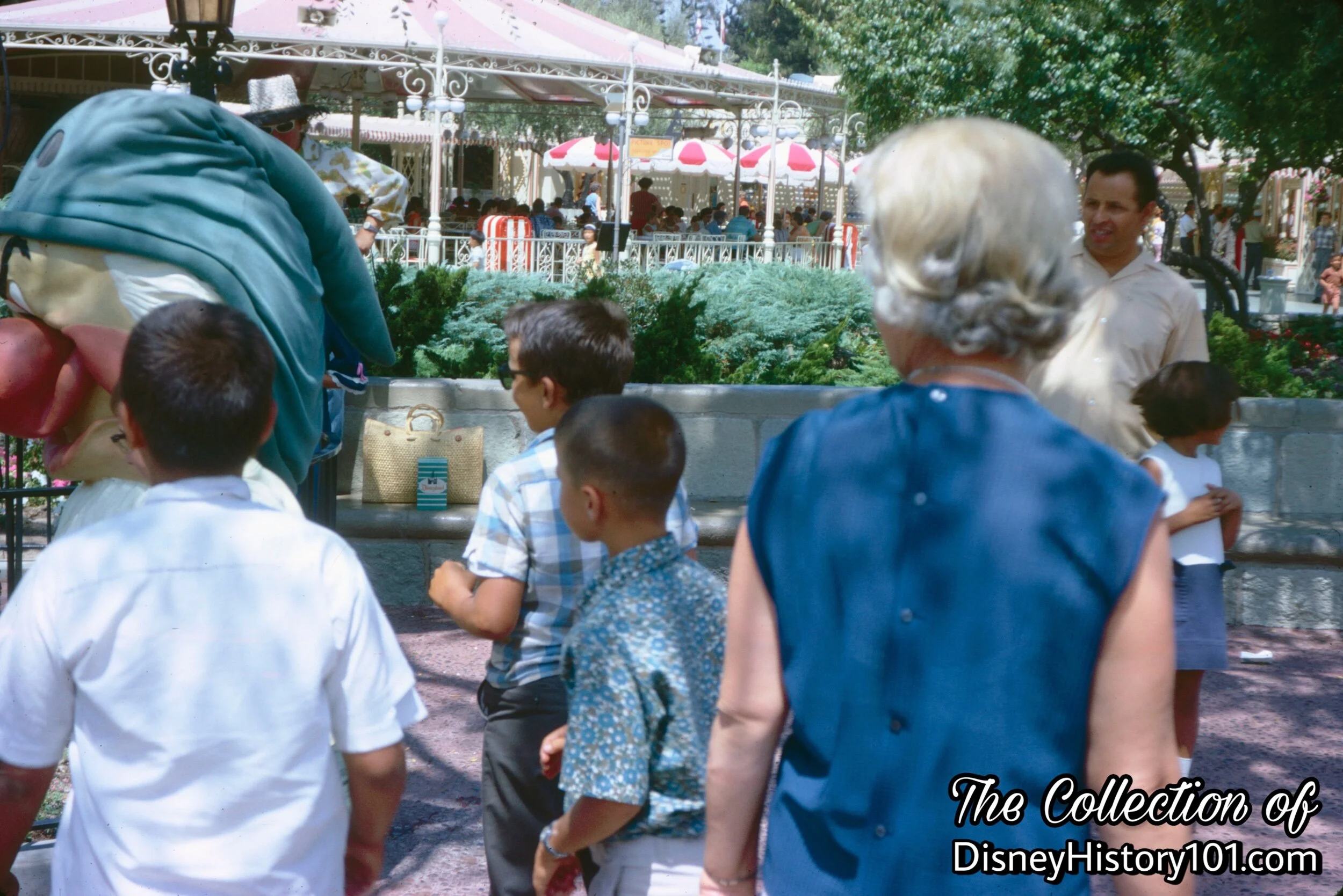 Meeting the Dwarfs near the Carnation Plaza Gardens, c.1965.