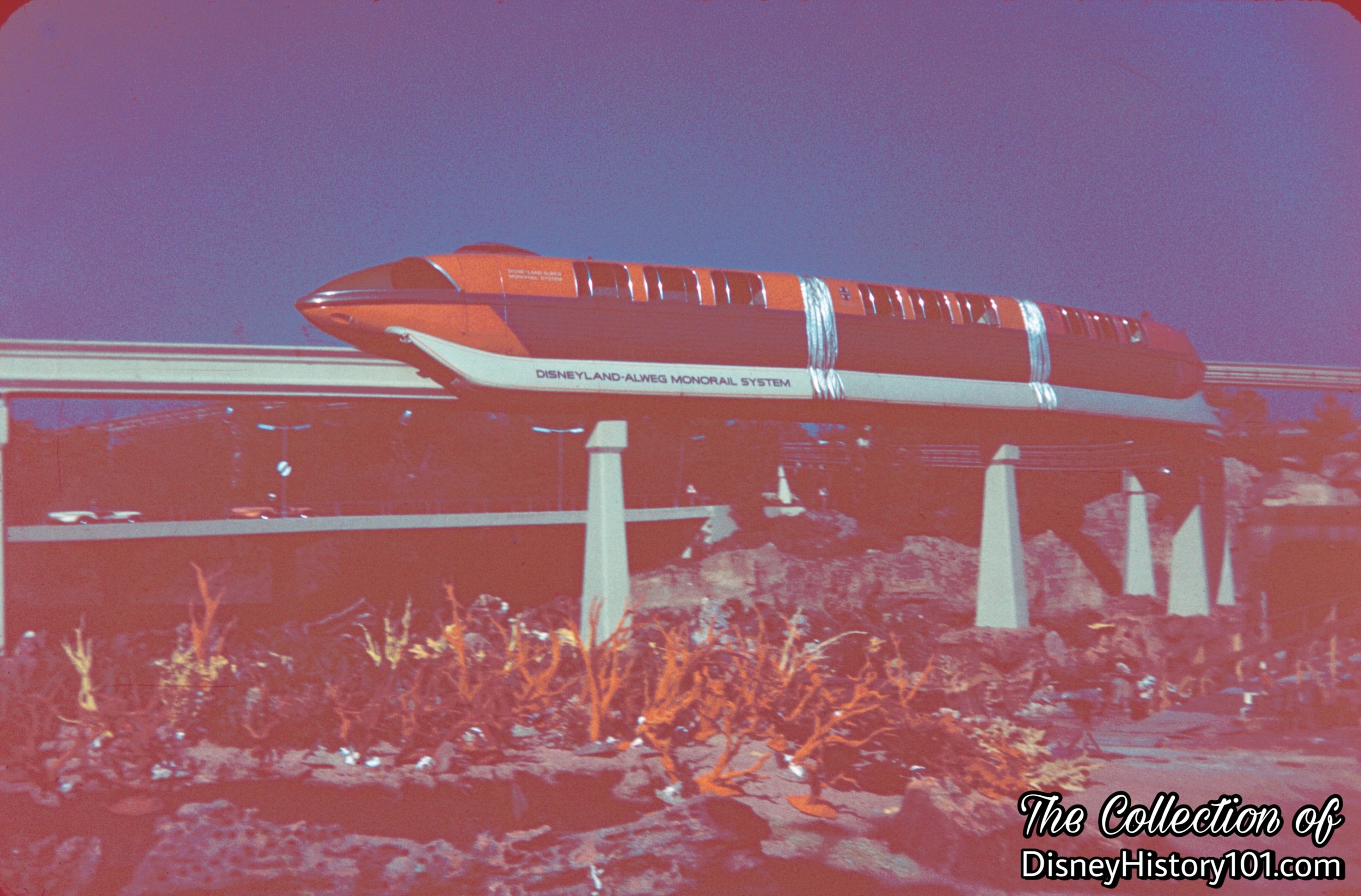 The new Santa Fe & Disneyland - ALWEG Monorail Mark I Red passes over the developing Submarine Lagoon, c.1959.