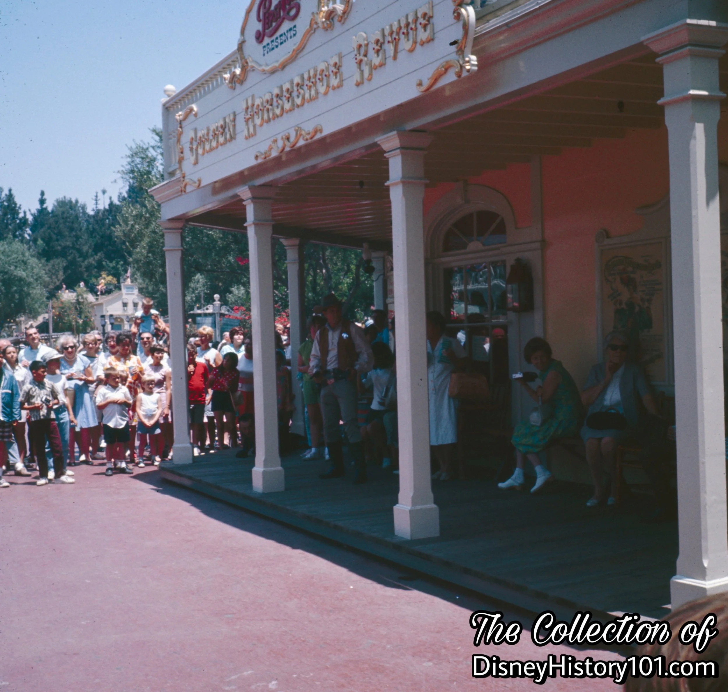 Guests gather around the Golden Horseshoe.
