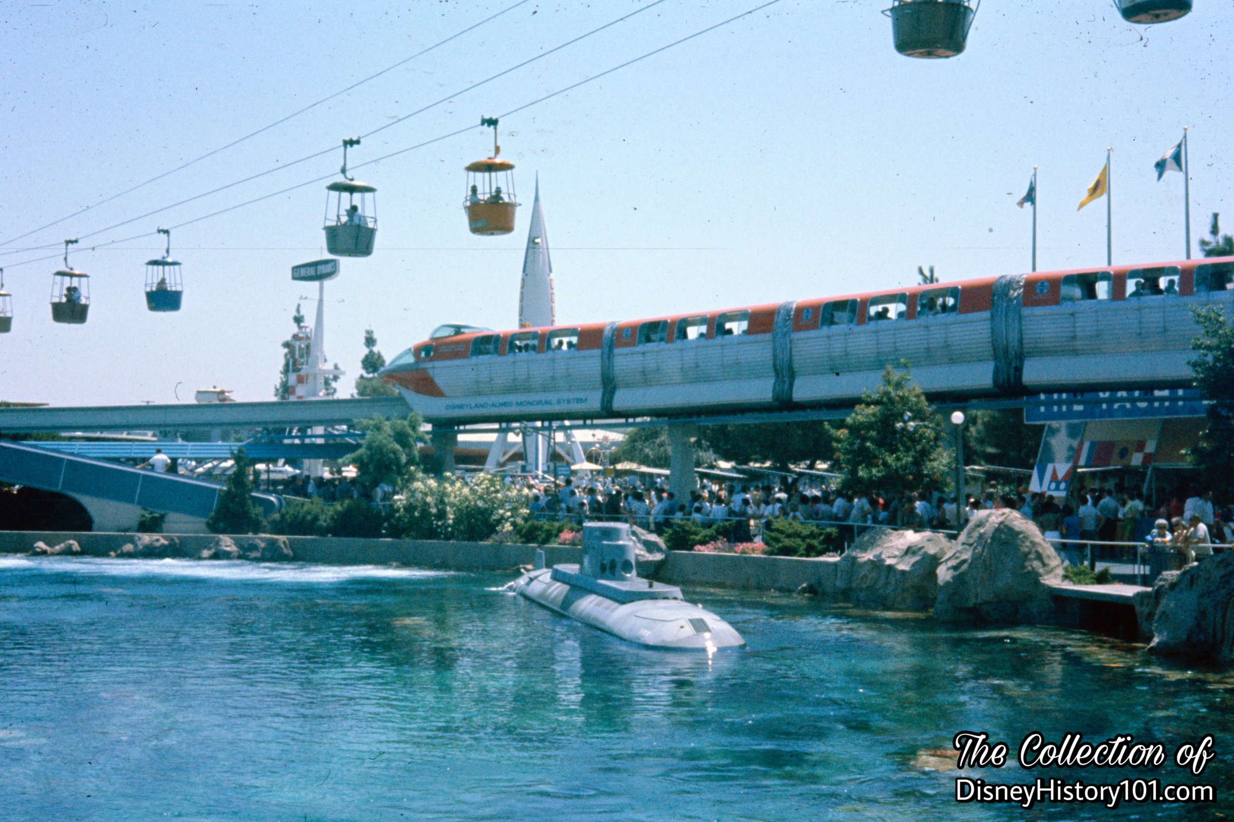 REENTERING THE PARK AND TOMORROWLAND SEGMENT - Monorail Mark II Red.