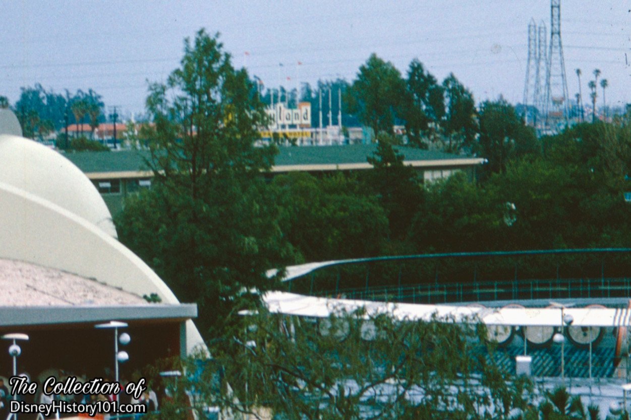 Notice the Flying Saucers (right) cycled-out on a rainy day in 1961.