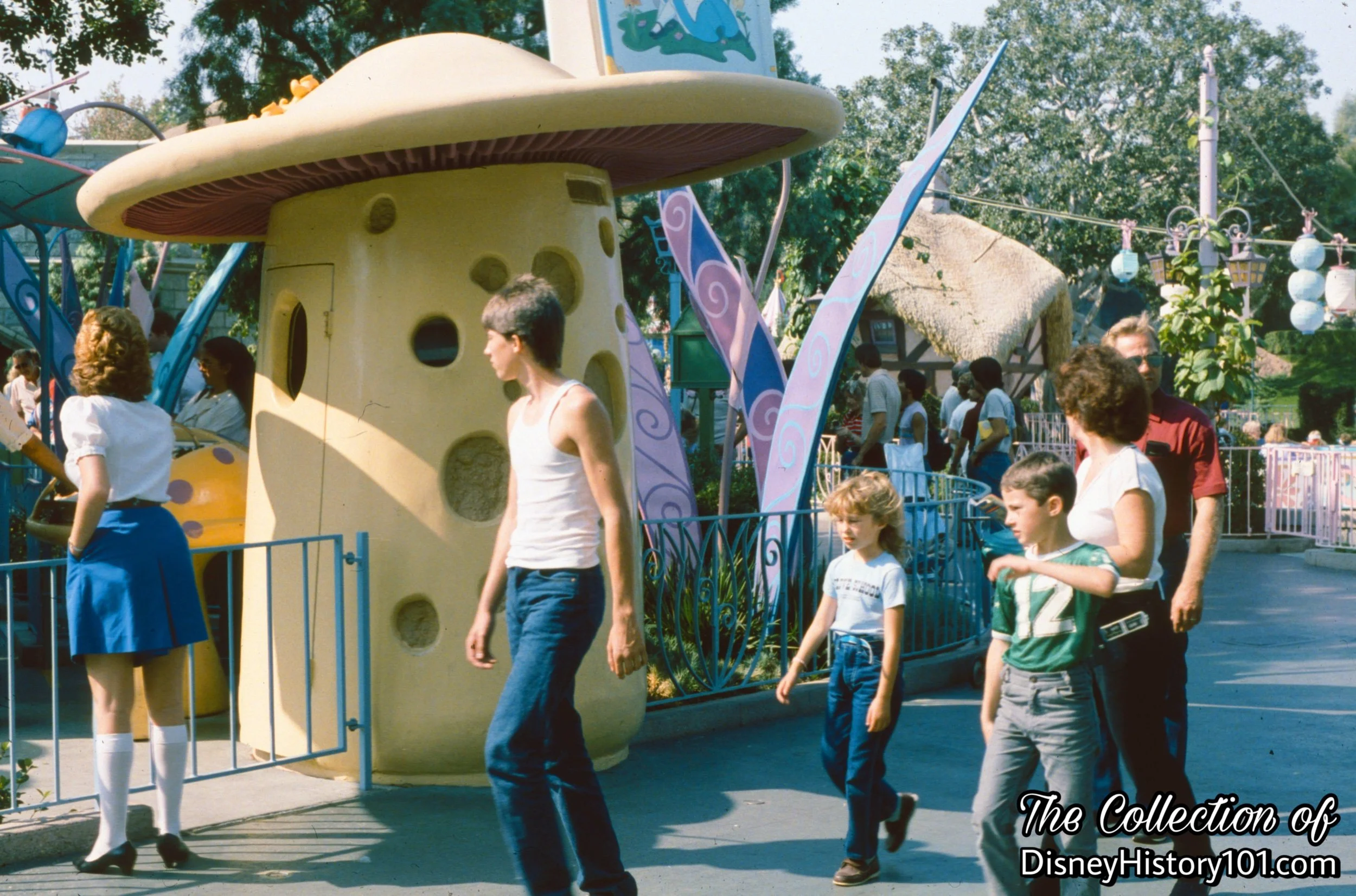Alice in Wonderland near Matterhorn Way. Note the Attractions Hostess (left).