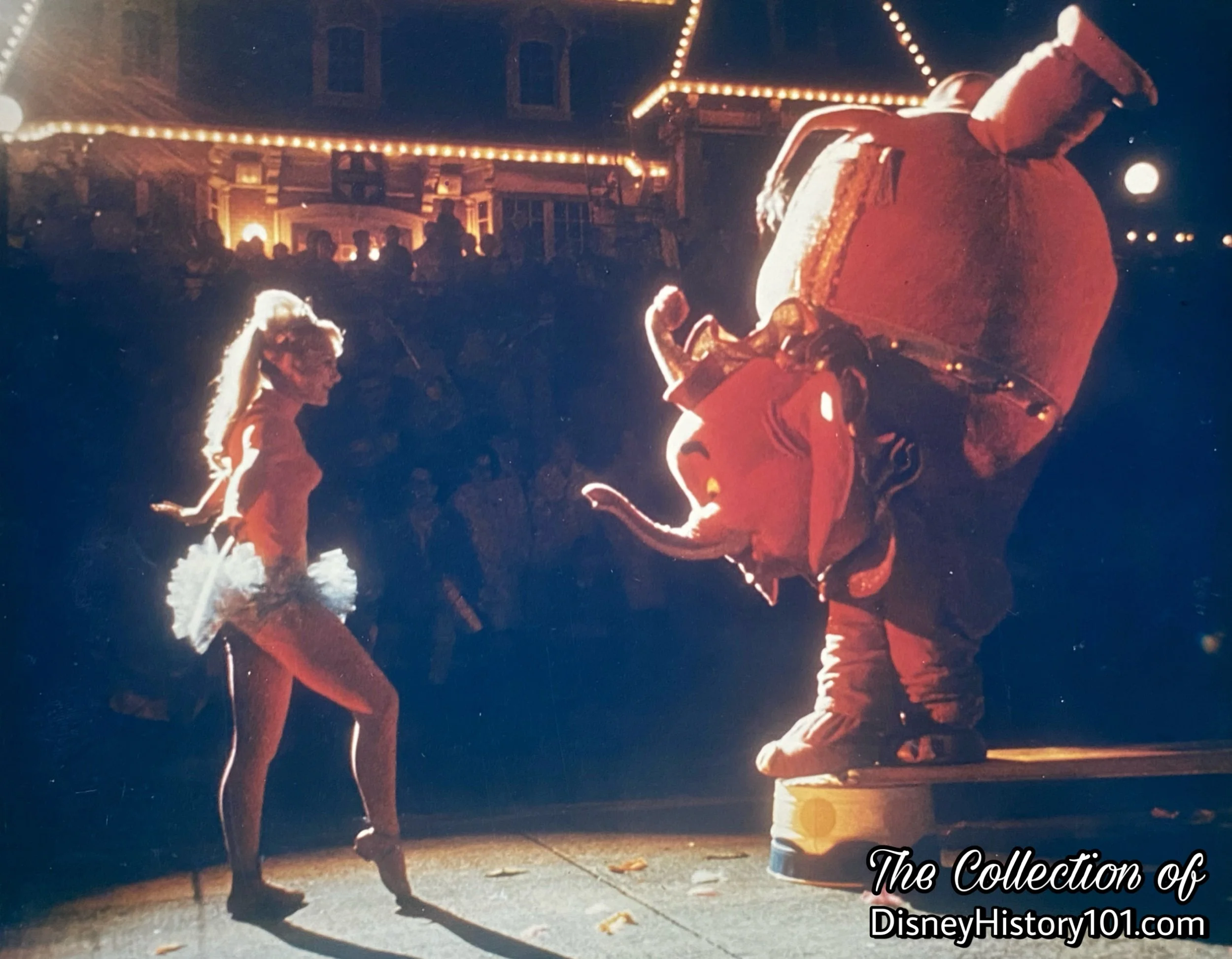 An Elephant performs a routine handstand in a circus-themed unit of Fantasy on Parade.