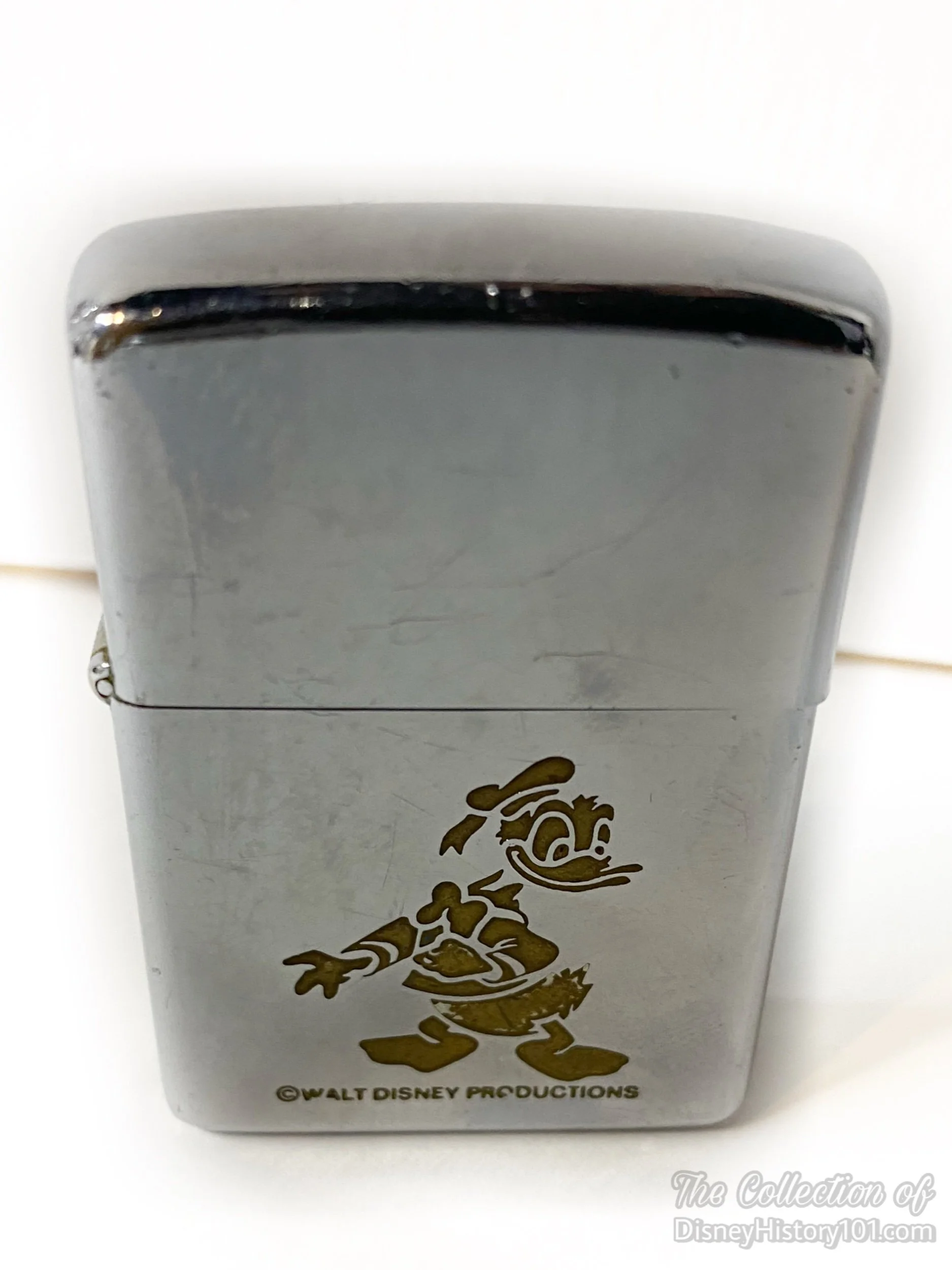 A Donald Duck Lighter by Zippo.