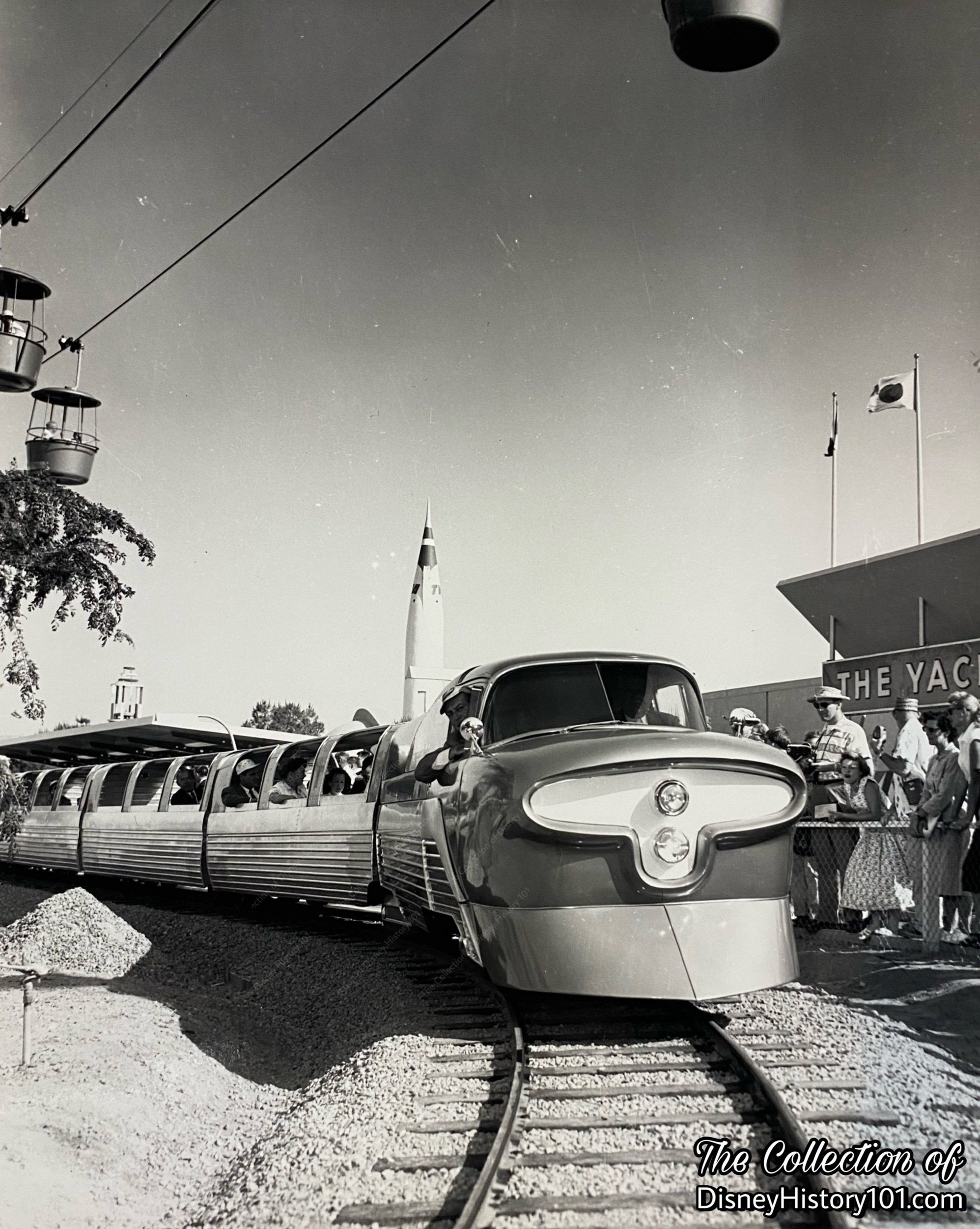 A press release photo of Walt Disney aboard the Viewliner Train of Tomorrow; ©️Walt Disney Productions