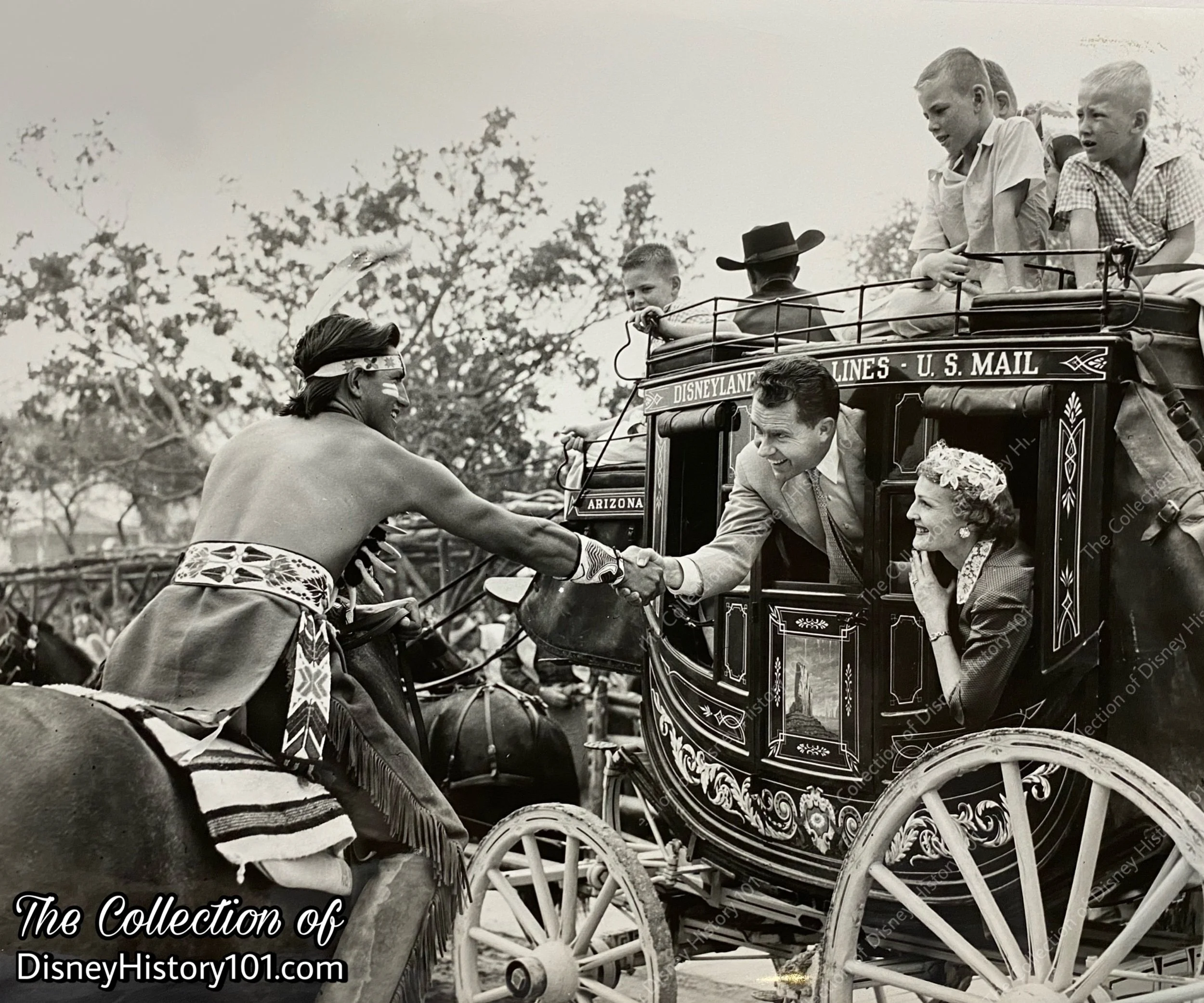 A press release photo depicts an Indian Village representative greeting stagecoach passengers; ©️Walt Disney Productions.
