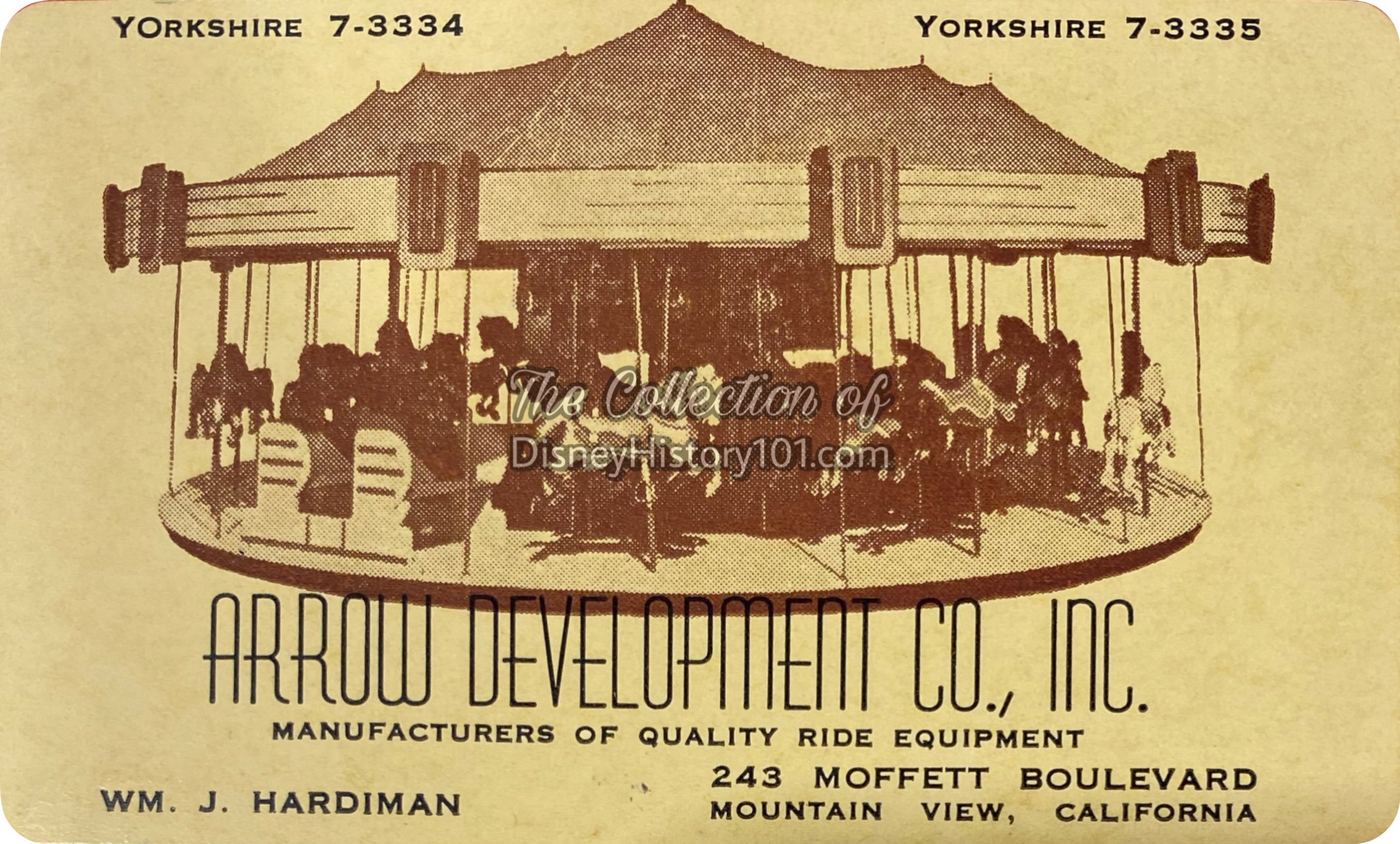 An Arrow Development Co. business card.