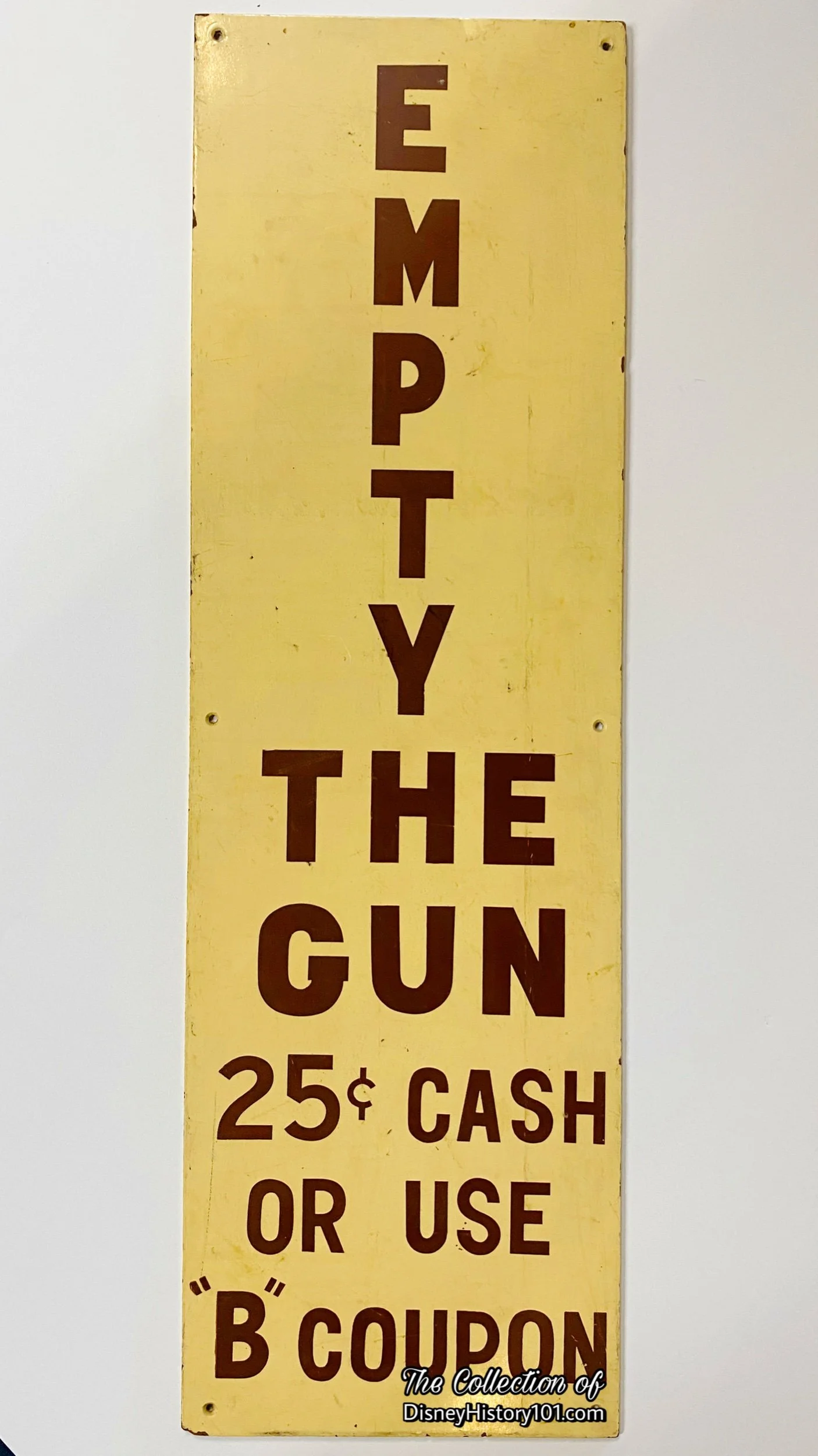 Another "Empty the Gun" sign.