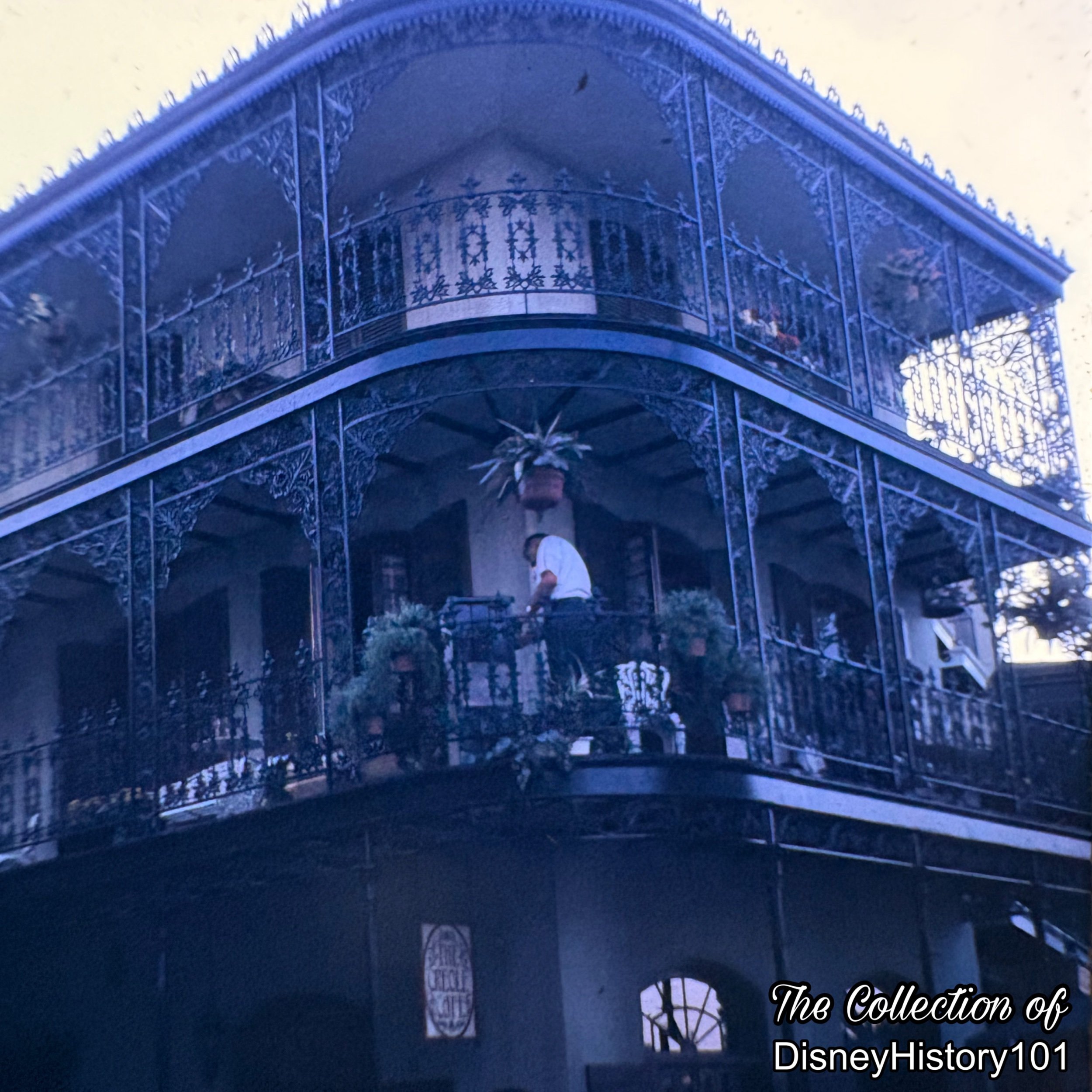 Show quality-enhancing maintenance being performed on an upper balcony of Club 33. 