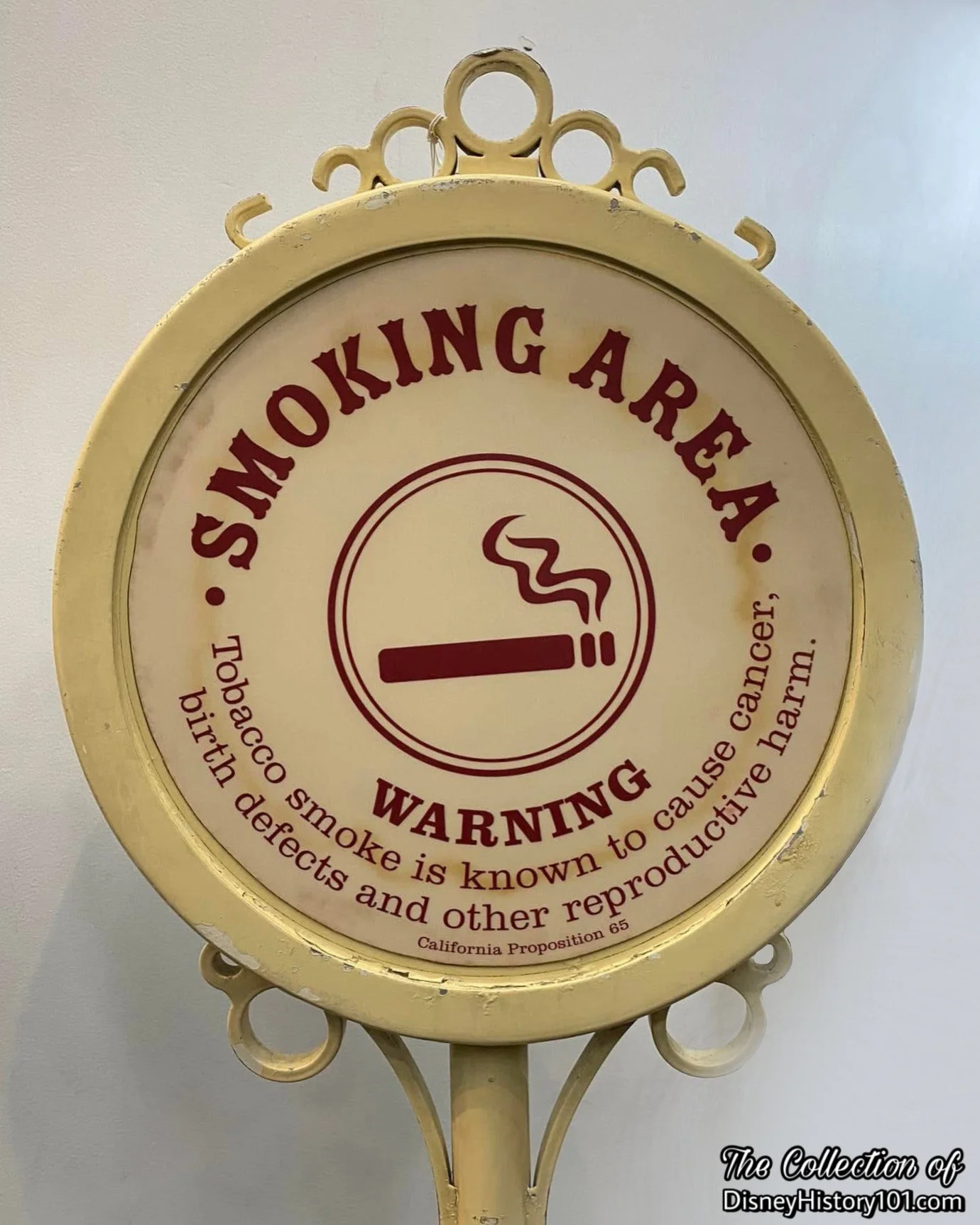 This progressive Disneyland “Smoking Area” Sign administered warnings of cancer, birth defects, and reproductive harm, in addition to referencing California Proposition 65.