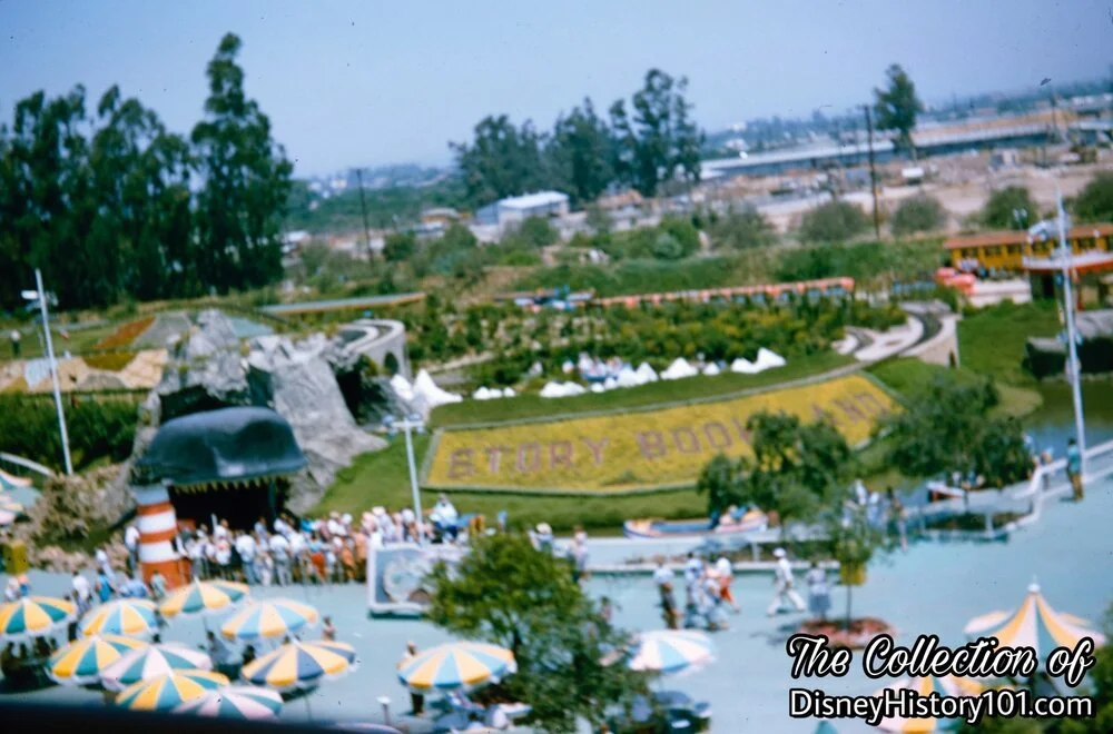In the distance, you can see the orange Viewliner Train, behind Storybook Land.