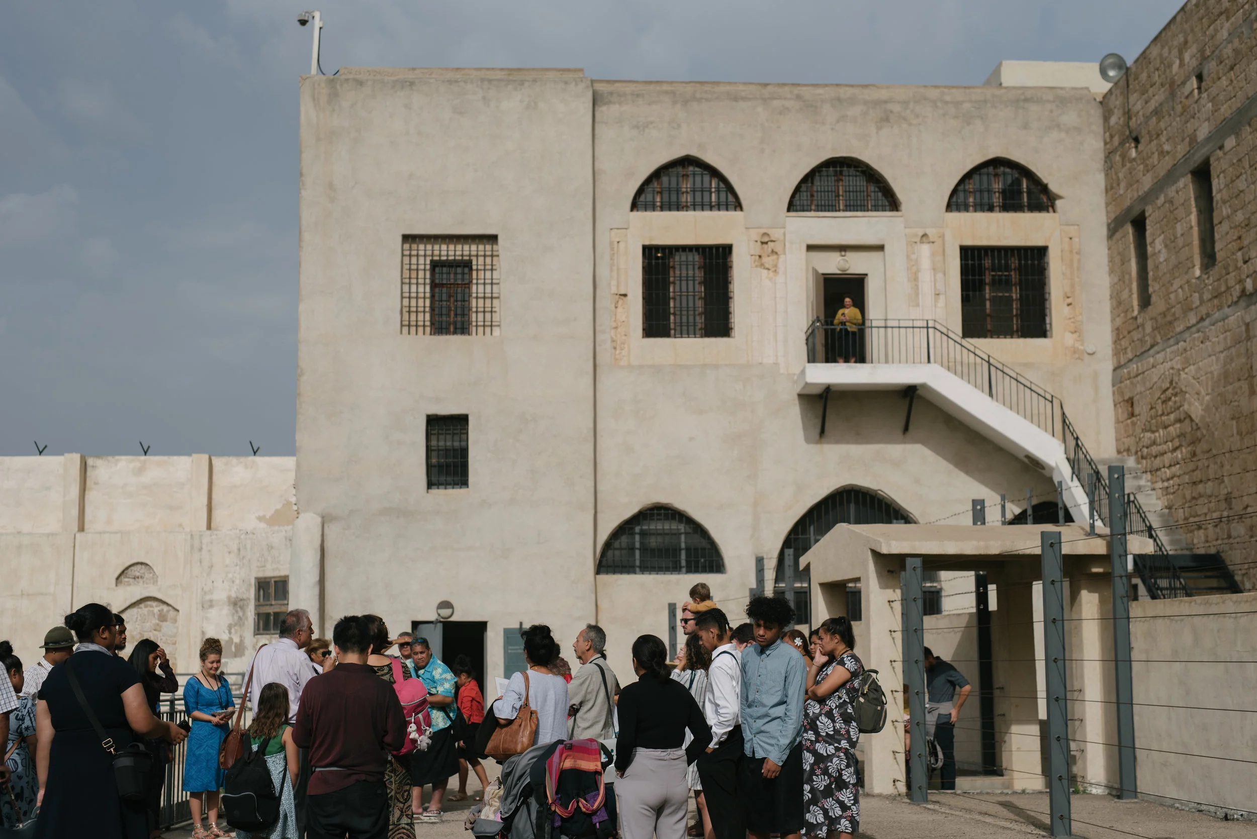 The pilgrims regroup after a visit to the prison in Akka, where Bahá’u’lláh was confined.