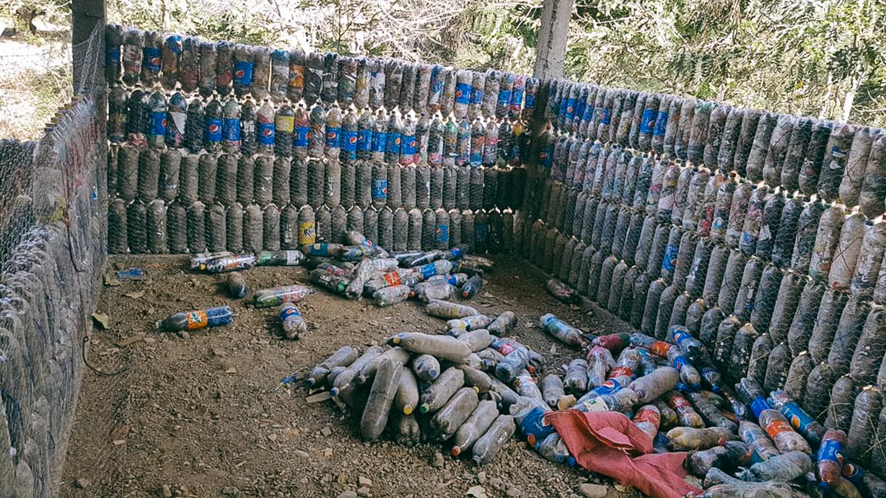 The plastic bottles are used as bricks.