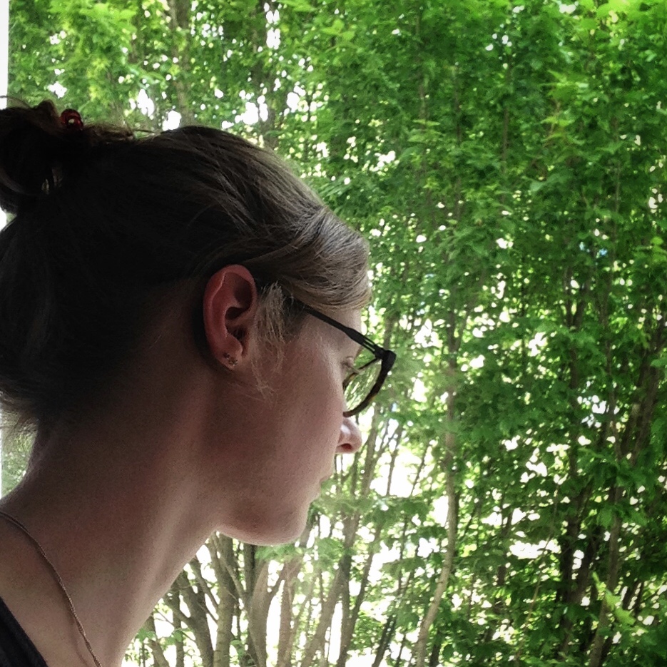 Erin+Headshot+Trees.jpeg