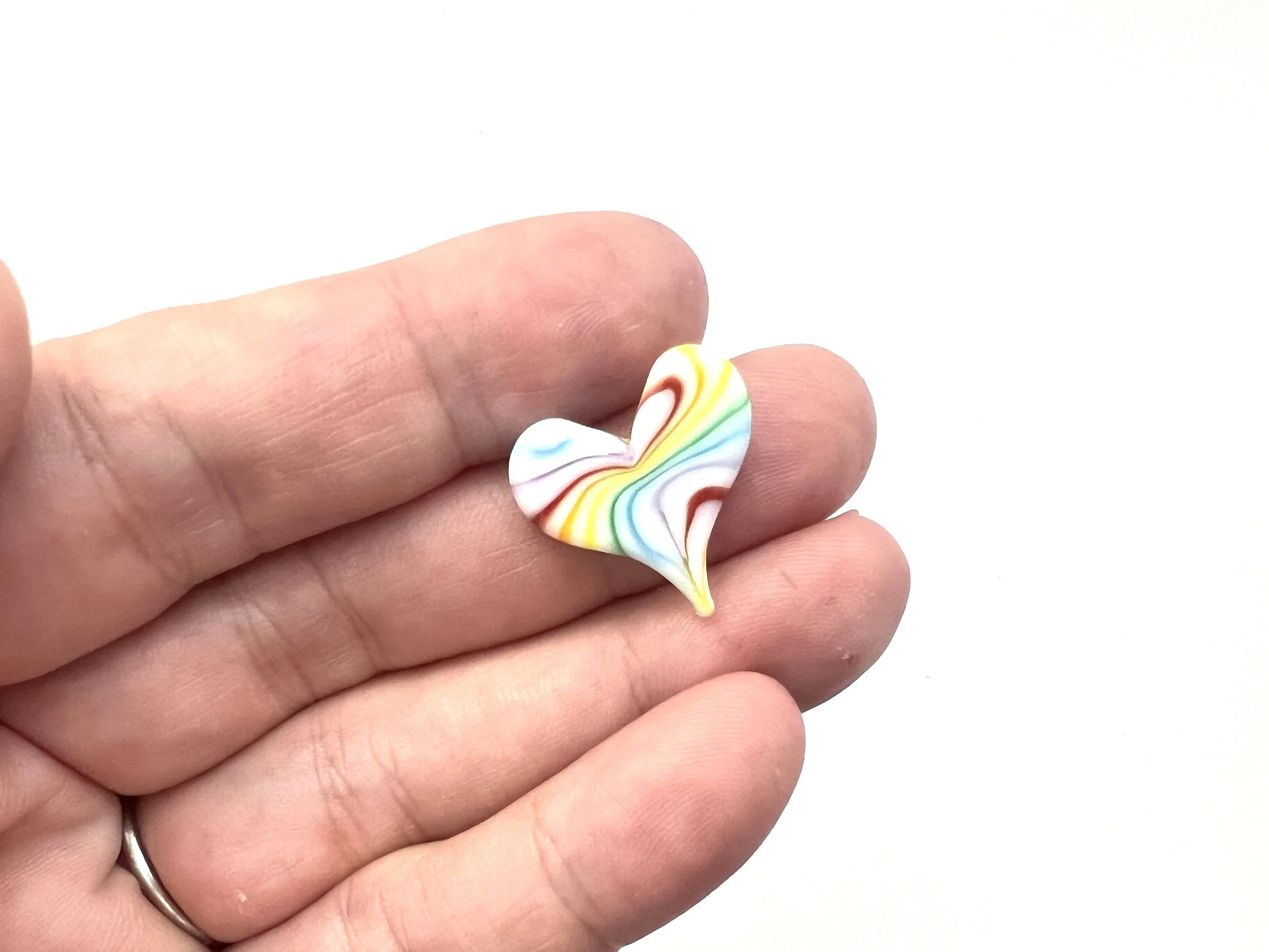 Rainbow 1 in Hand.JPEG