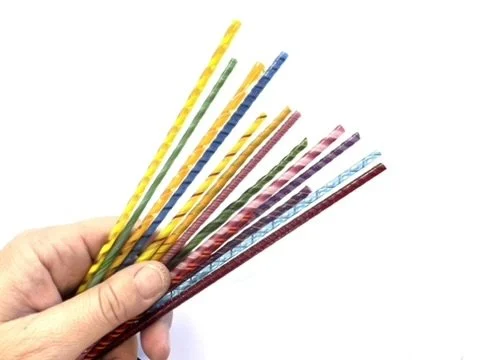 COE 90 Glass Twisties in Hand.JPEG