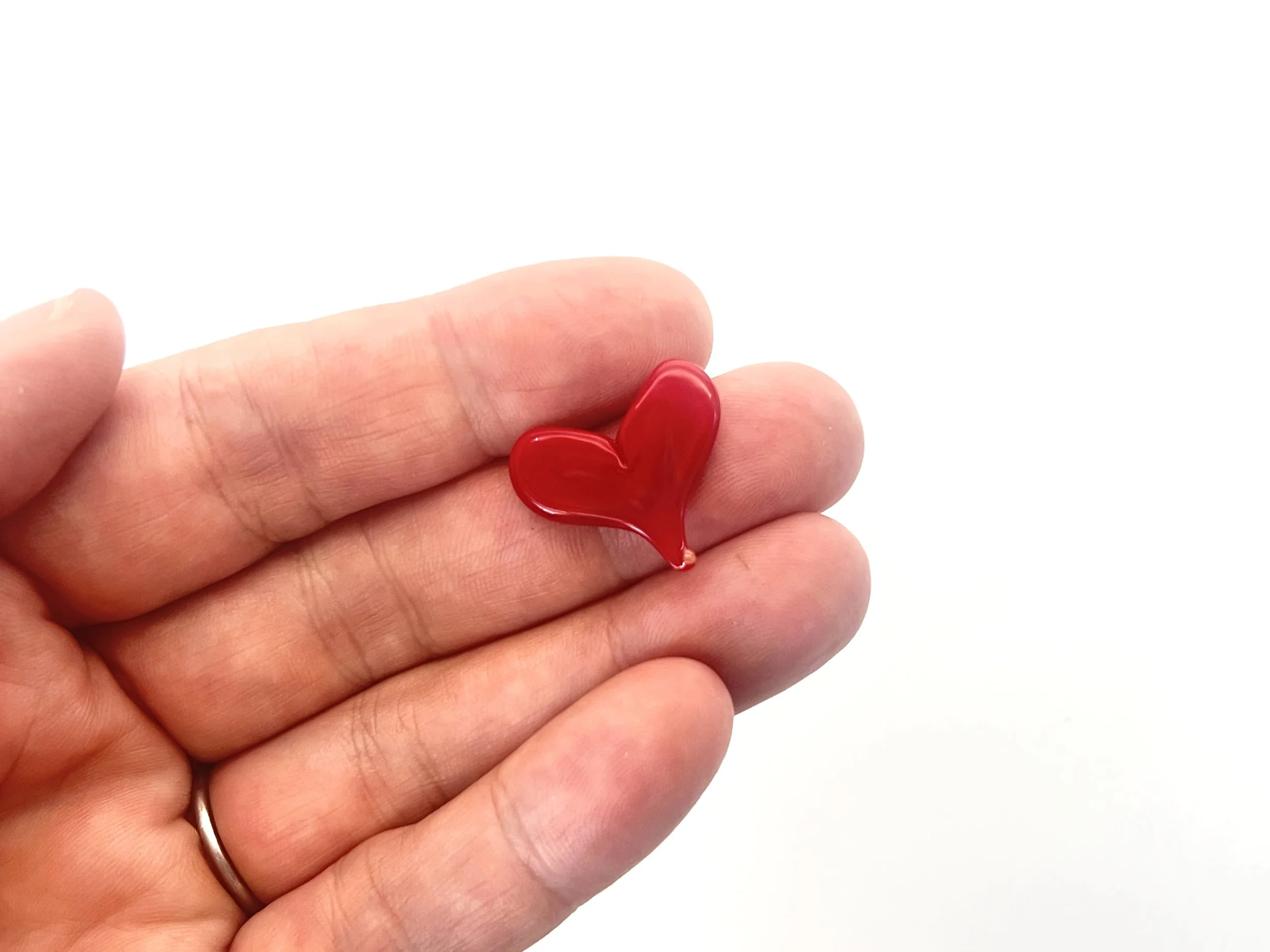 Red Opal in Hand.JPEG