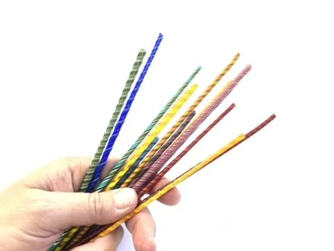 COE 90 Glass Twisties in Hand.JPEG