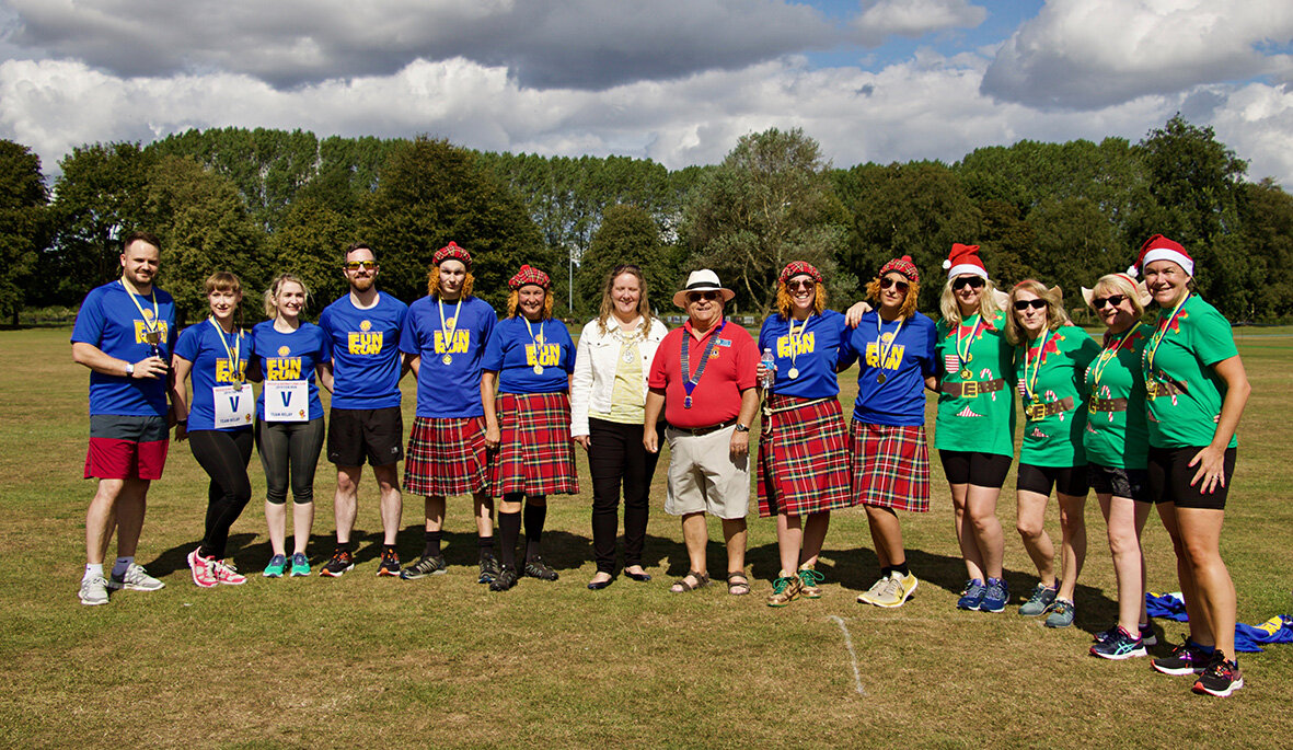 The Relay teams L-R, Blackwell Print, The Wine Vaults (with the Mayor of Beccles and the Lion President in the middle) and Santa’s Helpers.