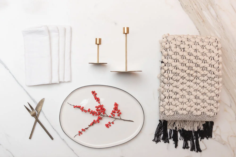 Cozy + White :: Gold Tapered Candlesticks :: Serving Platter :: Hand Knit Chunky Cotton Rug :: Bronze Serving Utensils :: Winter White Linen Napkins