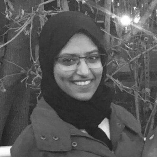 Rahaf smiling at the camera