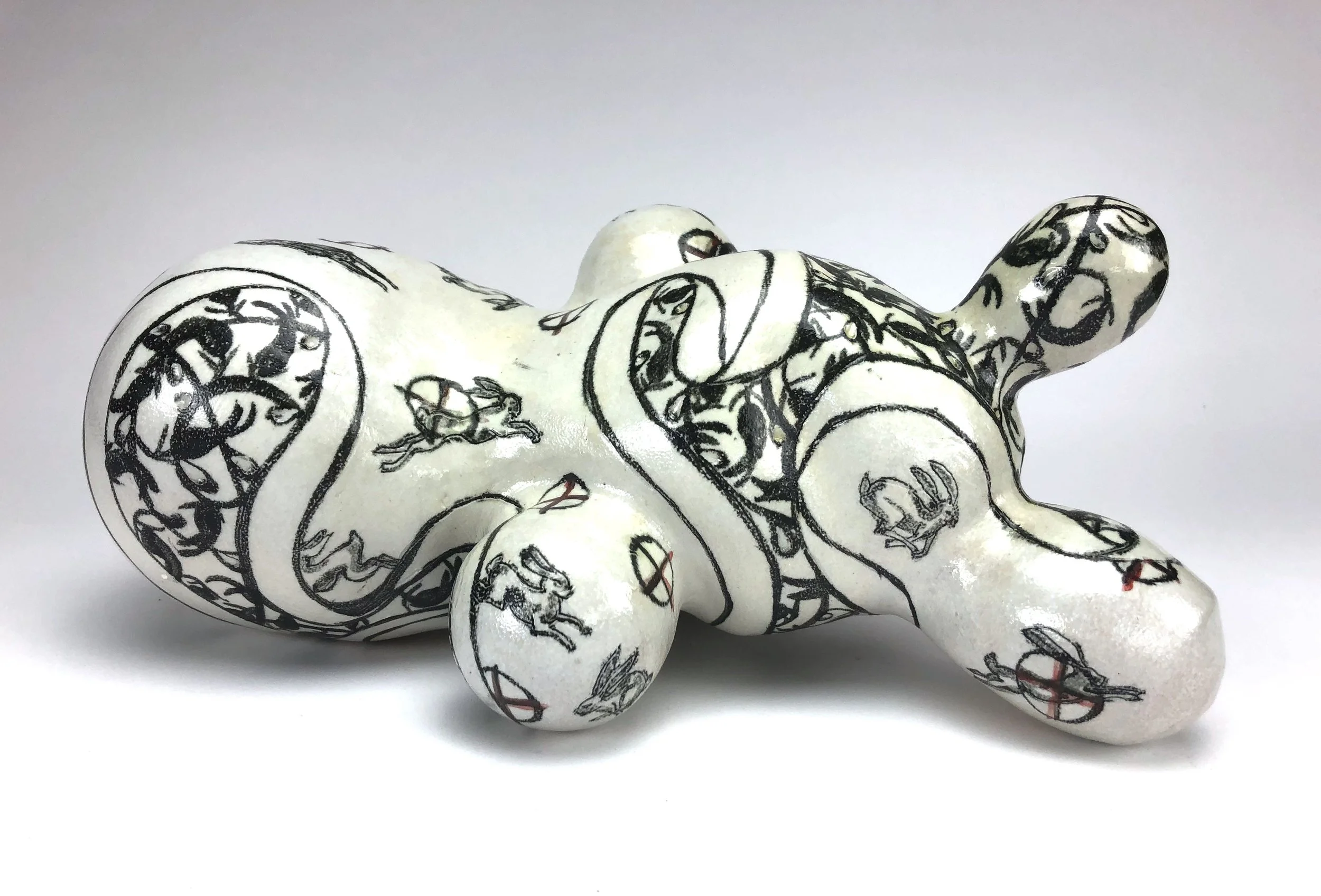 Tattooed Jelly Baby with Cross-hares.