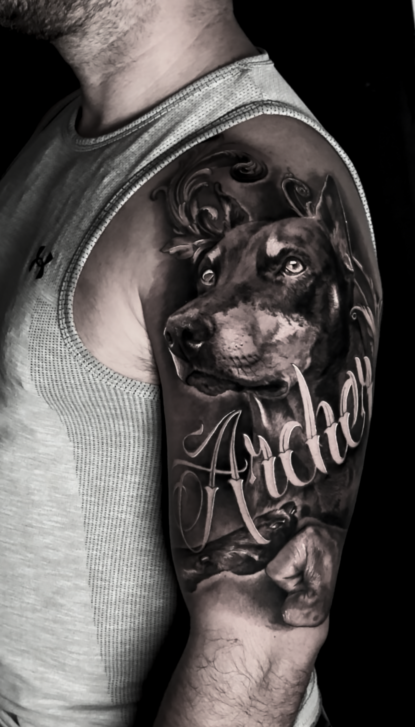 black-and-grey-realism-doberman-dog-portrait-tattoo.png