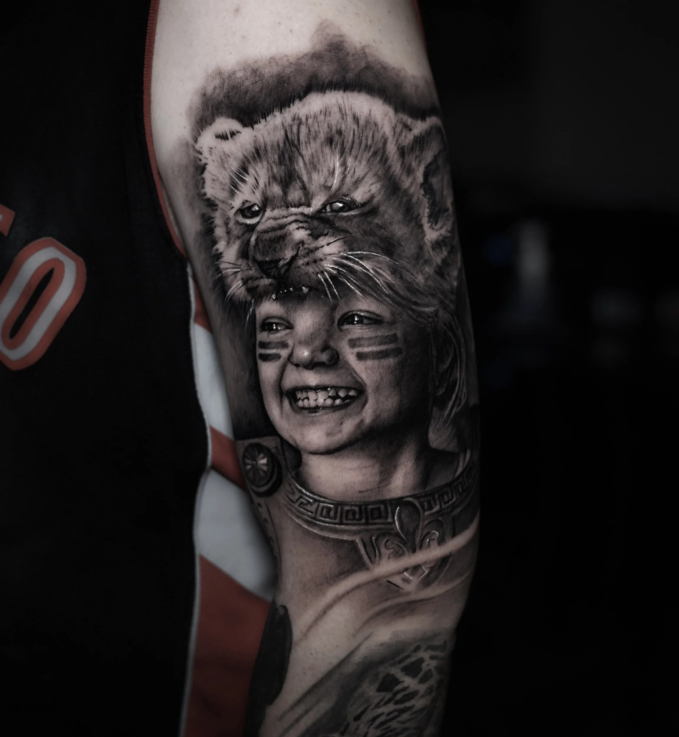child-and-baby-lion-portrait-black-and-grey-realism-tattoo.jpg