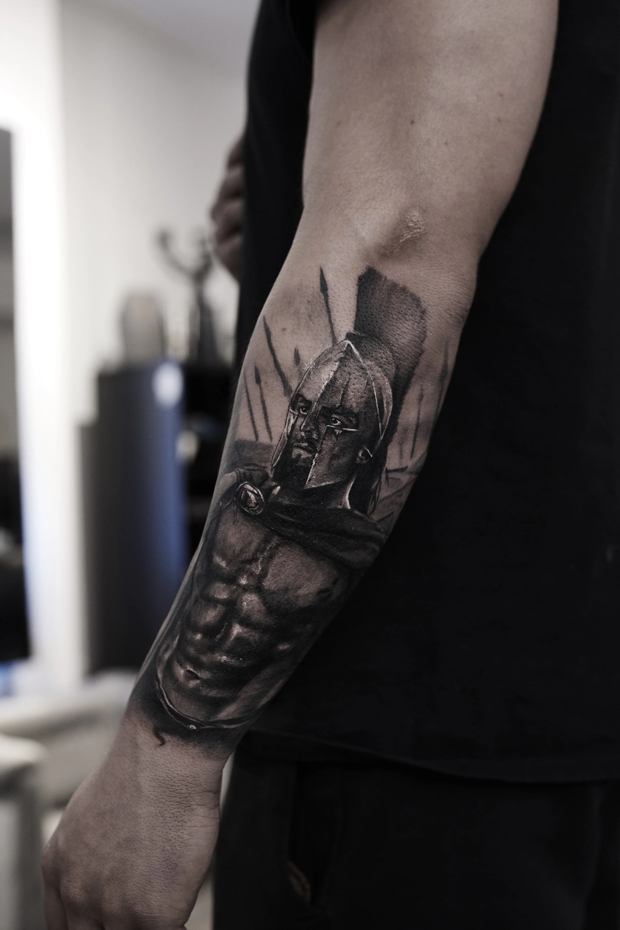 black-and-grey-spartan-realism-portrait-tattoo.jpg
