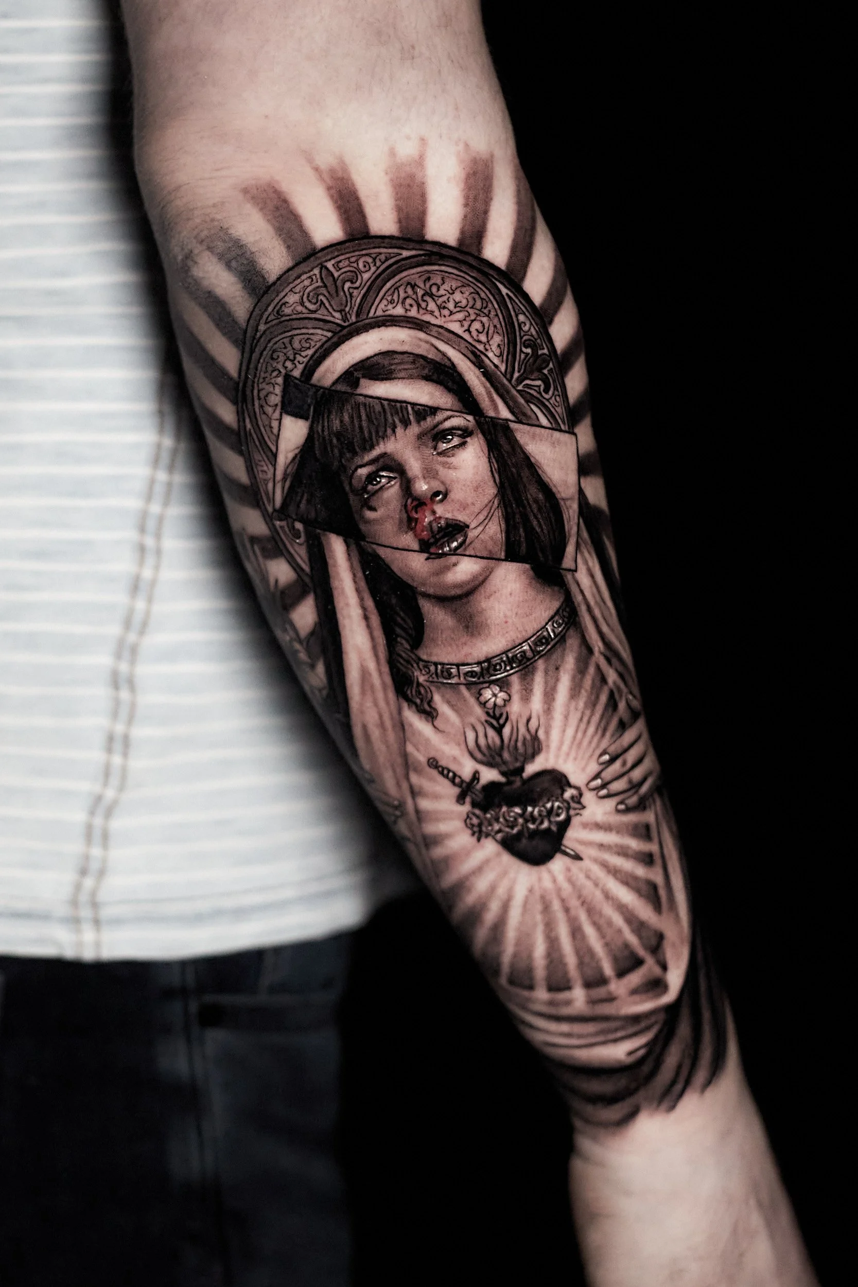 pulp-fiction-virgin-mary-realism-tattoo-black-and-grey-tattoo.jpg
