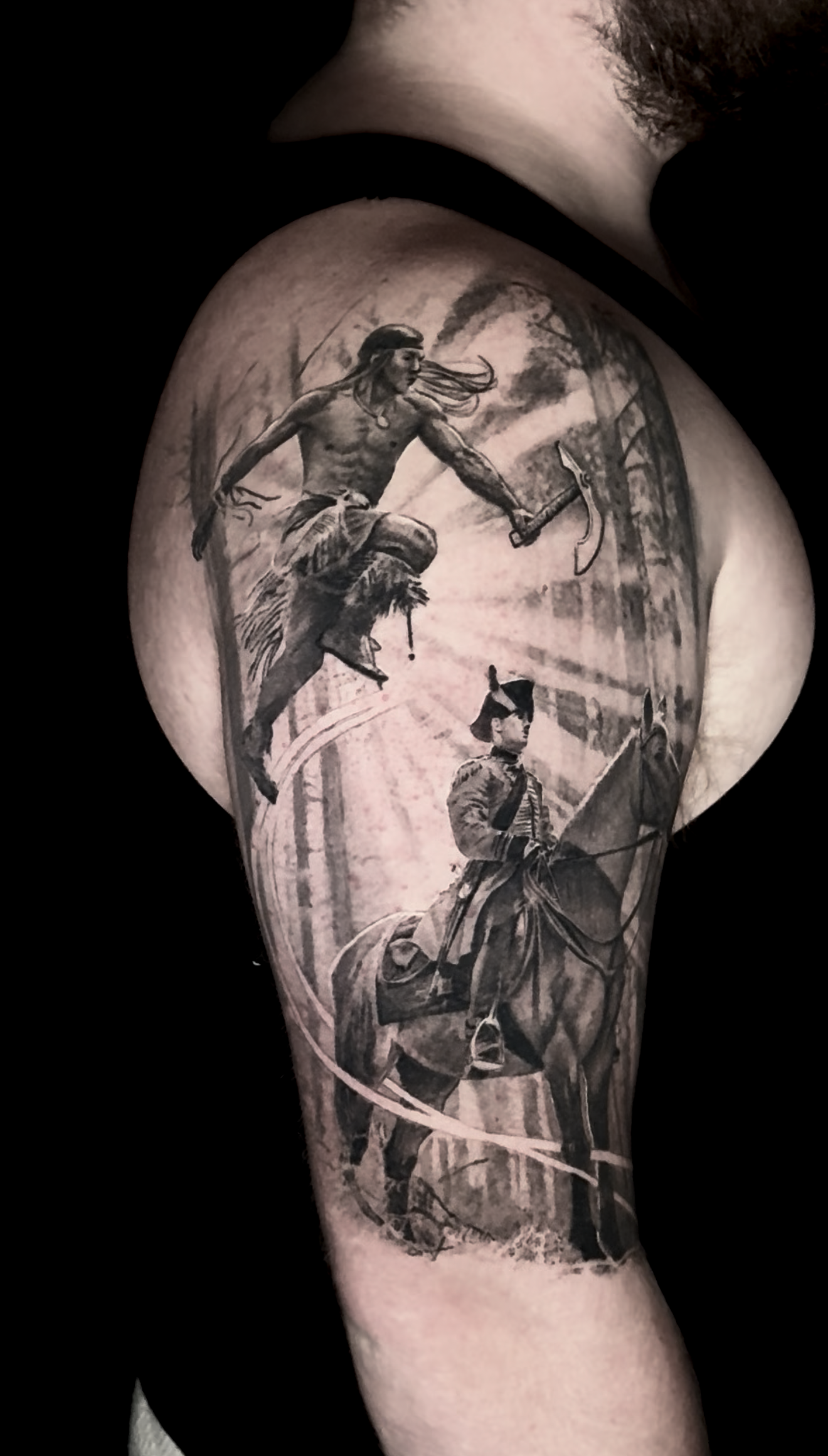 healed-black-and-grey-realism-native-hatchet-colonizer-tattoo.png